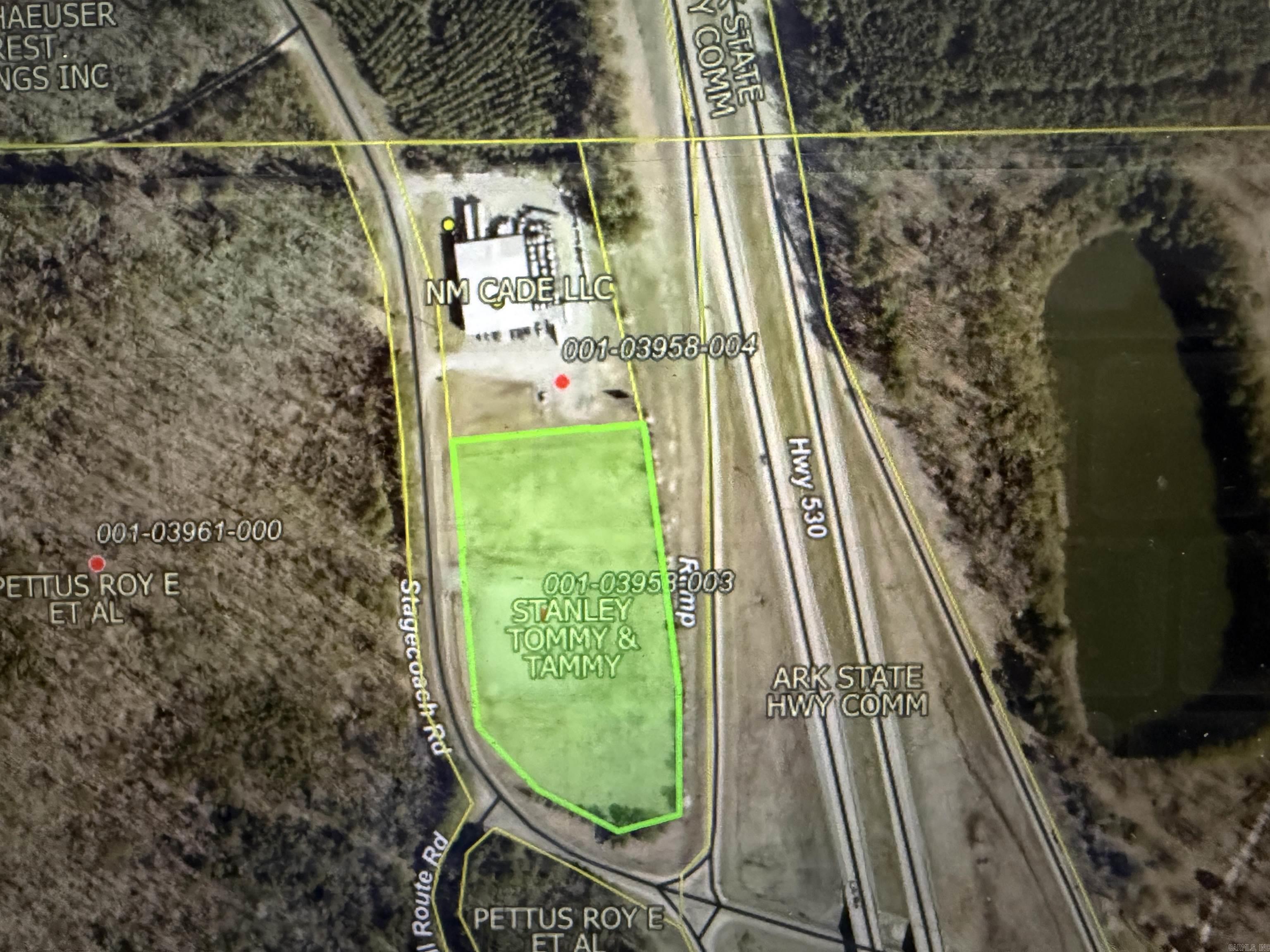 Interstate 530 ROAD FRONTAGE.  Approx. 3.61 acres that borders I-530 and exit 24.  Property has ashphalt drive and parking lot and is ready for your construction.