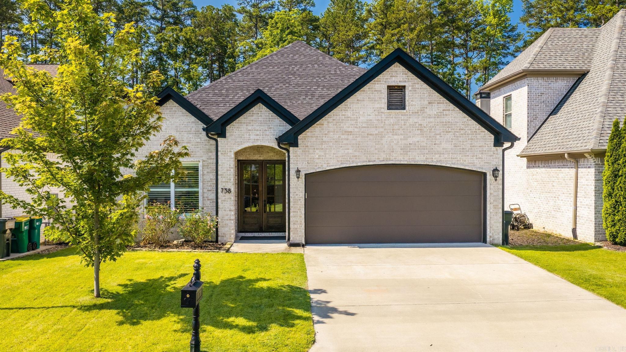Welcome home to this beautiful new listing in the highly coveted Chenal area, just moments from Wildwood Park for the Arts. This spacious 4-bedroom, 3-bathroom home offers the perfect blend of comfort, style, and functionality. Step through the grand double front doors into an inviting floor plan designed for both everyday living and entertaining. The stunning kitchen is beautifully appointed with stainless steel appliances, quartz countertops, a breakfast bar, and abundant cabinetry. The spacious family room features elegant tray ceilings that create an open, sophisticated atmosphere while providing the perfect gathering space. The owner's suite offers generous space, privacy, and a well-appointed en-suite bathroom designed for relaxation. Upstairs you'll find a versatile bonus room that can easily serve as a fourth bedroom, theater, or game room. Step outside to enjoy the peaceful setting as the backyard backs up to beautiful green space, providing added privacy and nature views. Plus, just across the street, you'll find an additional grassy area that's perfect for outdoor activities, play, or simply enjoying the open space.