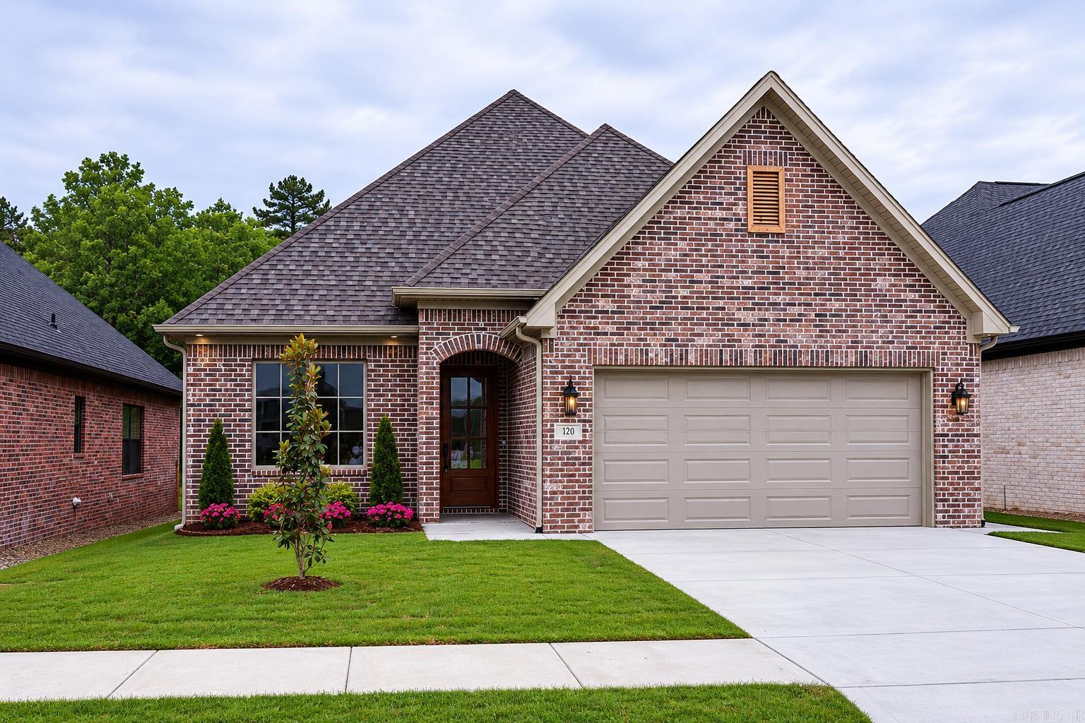 Welcome to this beautifully crafted new construction home located at 120 Kinley Loop! This one-level residence offers 3 spacious bedrooms and 2 full bathrooms across approximately 2,200 square feet of thoughtfully designed living space. The home has a large master suite with a spacious master bath and closet area. Enjoy a functional laundry room with lockers and a brook closet. An open and functional layout featuring a separate dining area, perfect for entertaining or family gatherings. The home backs up to peaceful green space, providing added privacy and scenic views. The home also comes with a brick privacy wall on the back porch and a TV hookup. A two-car garage adds convenience and storage shelving. Situated in a desirable neighborhood with amenities including a community pool and park, this home offers both comfort and lifestyle. Don’t miss your opportunity to make this stunning home yours!