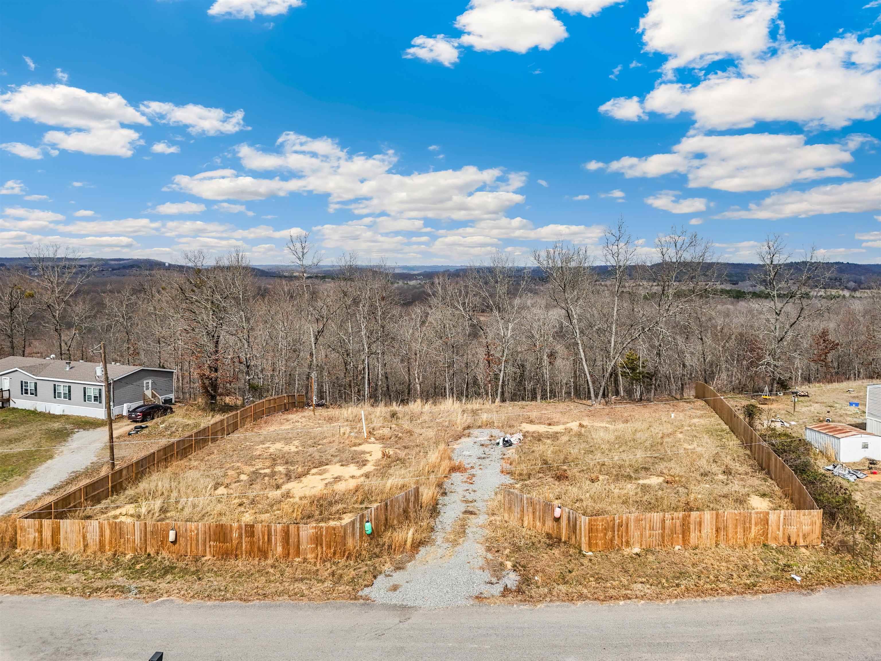Great spot to place a camper and enjoy access to Cadron Creek, or your next spot to build your home without restrictions. Possibilities are endless with this Property.