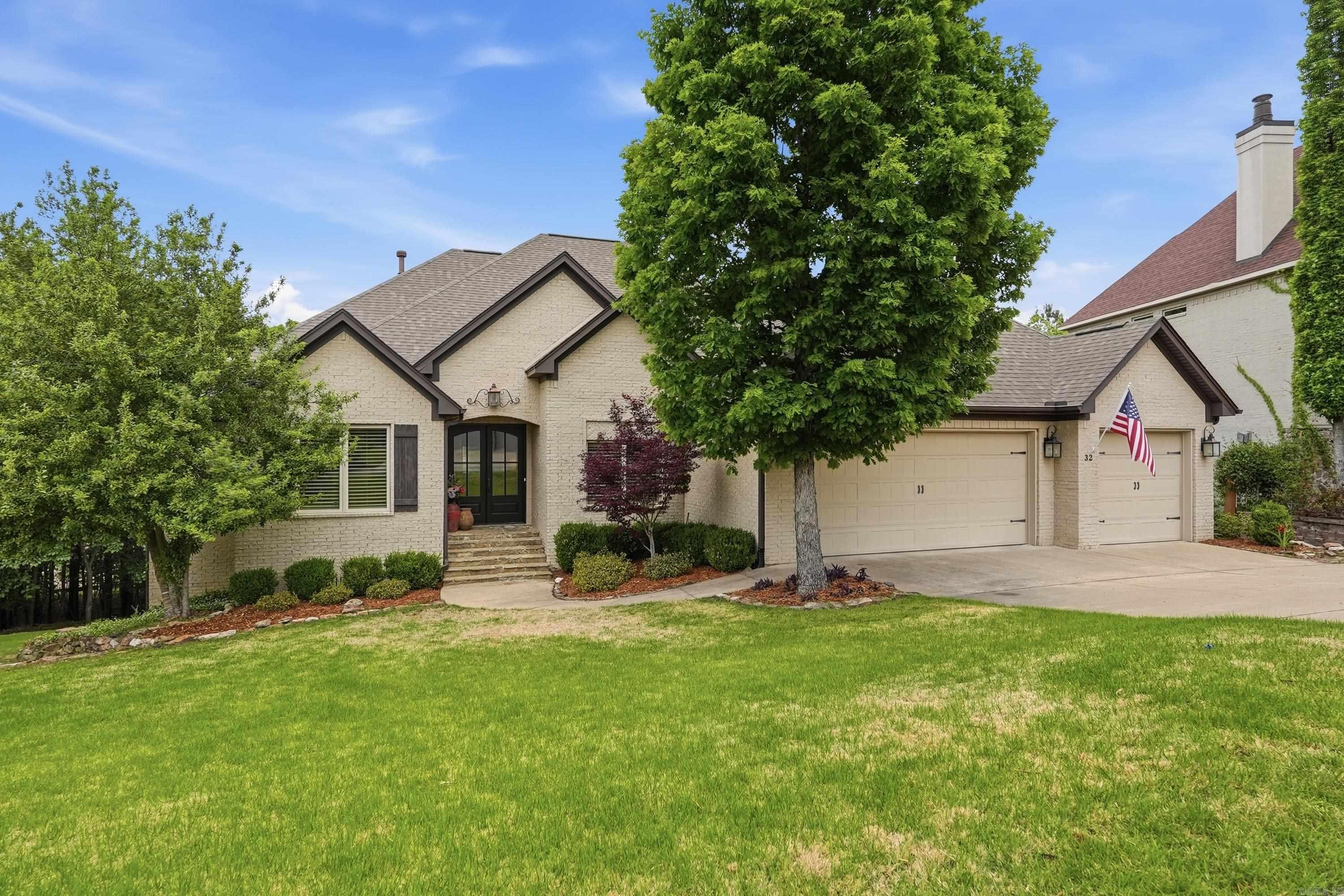 Welcome to Winthrop Point in sought-after Woodlands Edge! This beautifully designed 3,395 SF home offers 4 BRs, 3.5 BA, an ideal blend of comfort and luxury. The main level features 10-foot ceilings, a spacious great room with a gas-log fireplace, Formal Dr, office w/closet, and a chef’s kitchen complete with a gas range, double ovens, microwave, ice maker, two sinks, two disposals, large island with breakfast bar, and walk-in pantry. A cooled walk-in wine room adds a unique touch for entertaining.  The primary suite features double vanities, a jetted tub, separate shower, and oversized walk-in closet. A half bath & laundry room complete the main level. Upstairs offers additional bedroom/bonus rm, including a closet & full bath, plus walk-out attic storage.  Enjoy outdoor living on the expansive deck with hot tub overlooking a permanent greenbelt for added privacy and natural beauty. Additional features include an oversized 3-car garage with workshop space. Residents enjoy neighborhood amenities including a pool, park, walking trails, and green spaces. Conveniently located near shopping, dining, w/easy access to the city, this exceptional home offers the best of West Little Rock.