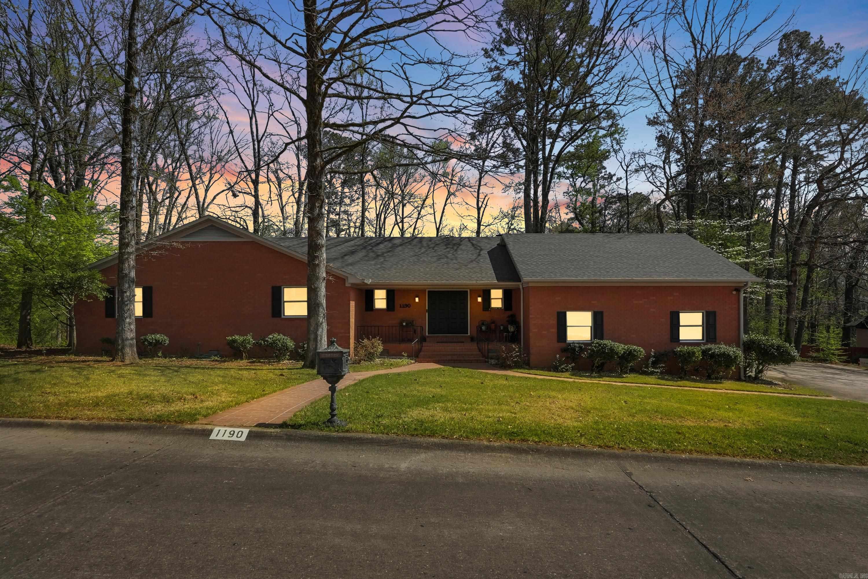 Welcome home to 1190 Cambridge Circle in Benton, Arkansas, a spacious one level brick home with a WHOLE HOUSE GENERATOR on nearly half an acre in one of Benton’s most desirable neighborhoods! Homebuyers searching for homes in Benton, AR with space, comfort, and convenience will appreciate ALL this property offers. This spacious 3 bedroom, 2 bathroom home features wood flooring throughout, oversized bedrooms & lg living room w/ a gas log fireplace & wet bar, perfect for entertaining. The lg chef’s kitchen offers abundant cabinet space, double ovens & gas cooktop, ideal for hosting. The primary suite feels like a private retreat w/ a sitting area, 2 closets & a spacious bathroom w/ double sinks, garden tub & separate shower. Updates include a new roof in 2022 & new toilets in all bathrooms. Enjoy outdoor living in the fully fenced private backyard w/ mature trees, plus added features like a whole house generator, gutters, 2 sprinkler systems, storage under the home & oversized storage room in the garage. Conveniently located near shopping, dining, and schools, this home offers both space and function in a prime Benton location. Schedule a tour today & see why this home stands out.