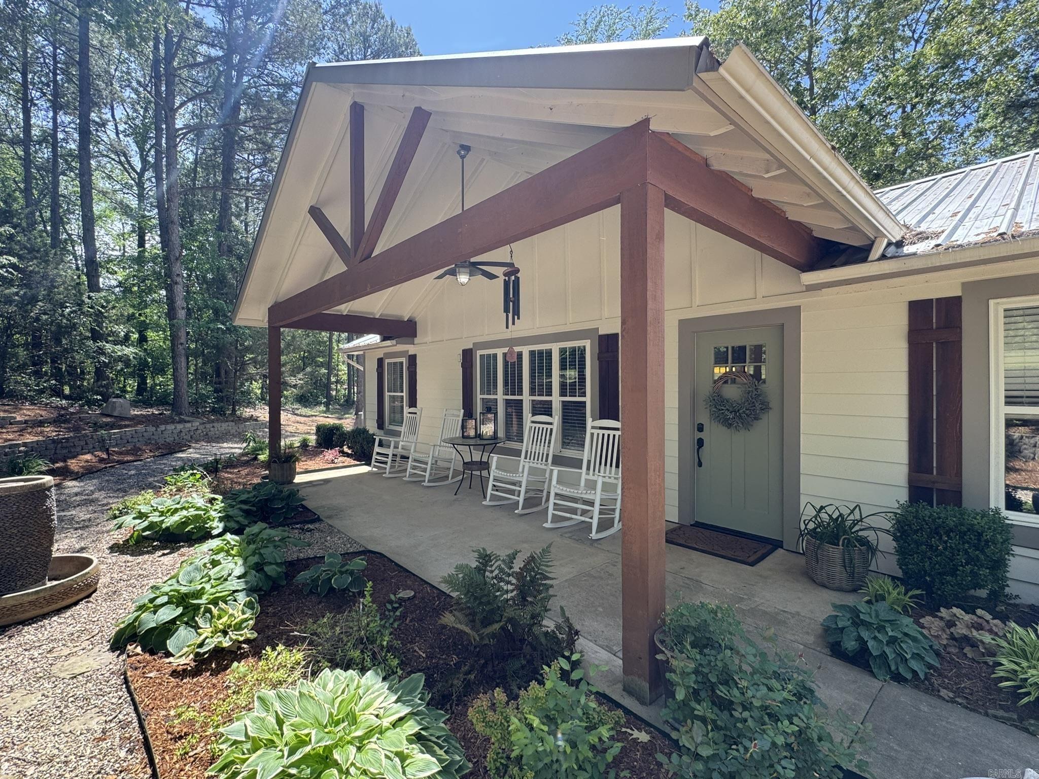 Welcome to your private retreat in Beebe, Arkansas! Situated on approximately 2 beautiful acres, 150 Old Schoolhouse Rd offers a rare opportunity with two homes on one property—perfect for multi-generational living, rental income, or a private guest setup.  The main home has been thoughtfully updated and features 2–3 bedrooms. The flexible third room was originally designed as a movie theater, but can easily serve as a third bedroom, home office, or entertainment space—giving you the versatility to fit your lifestyle. Updates throughout the home provide comfort and modern appeal while maintaining a cozy feel.  The second home is a standout with its modern, open-concept design. It includes a loft-style bedroom along with an additional main-level bedroom, offering both functionality and style. The spacious living area is filled with natural light from large windows that showcase stunning views of the outdoor space. Step outside to enjoy the expansive deck and above-ground pool—perfect for relaxing or entertaining.  With scenic surroundings, flexible living arrangements, and unique features throughout, this property is a must-see for anyone looking for space, privacy, and opportunity