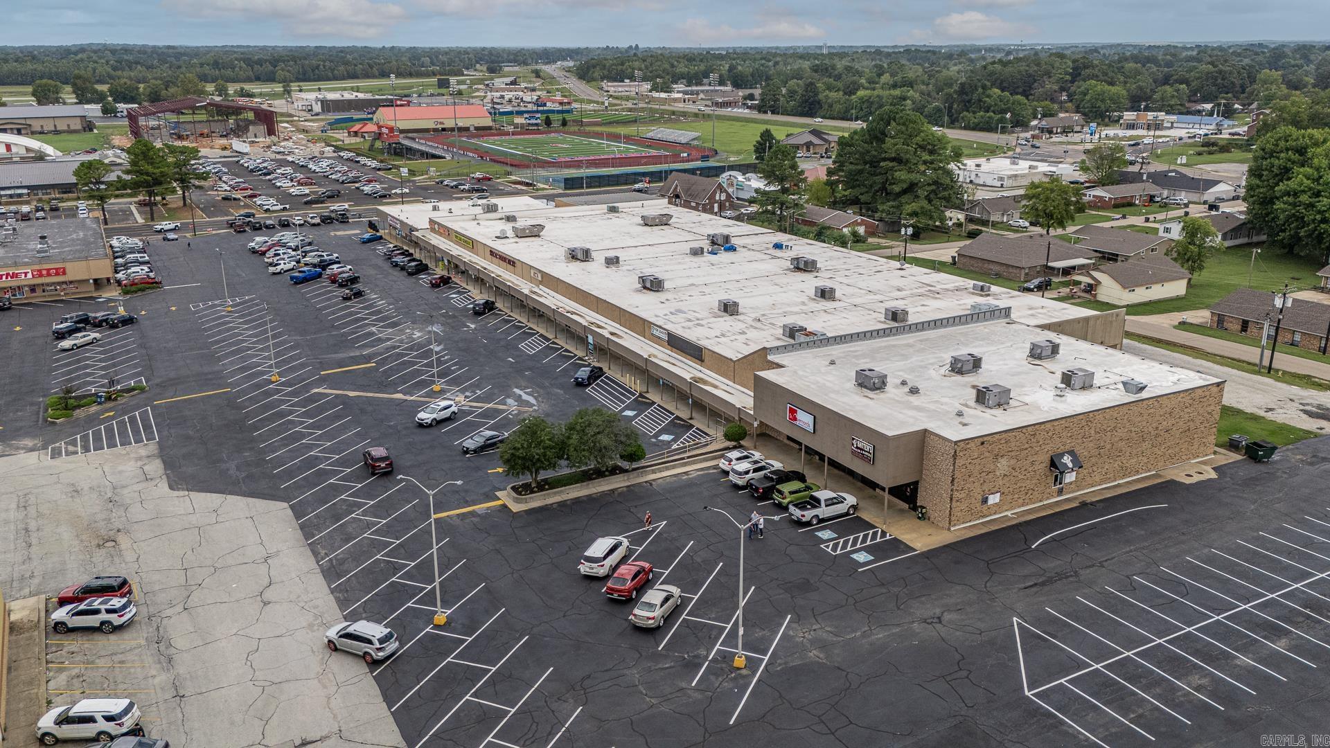 Great retail opportunity in Paragould Plaza in the center of town. Anchor stores include long time tenants Hays Grocery, Marco's Pizza, Taco Rio, Postnet, Southern Bank, Battens Donuts, Dollar General, Shoe Sensation and GameXchg. approx 19000 sf. of space, bathrooms, storage area. Open Concept and landlord will consider tenant improvements with lease terms. NNN Lease, Have concept plans for remodel of the storefront, former Freds space