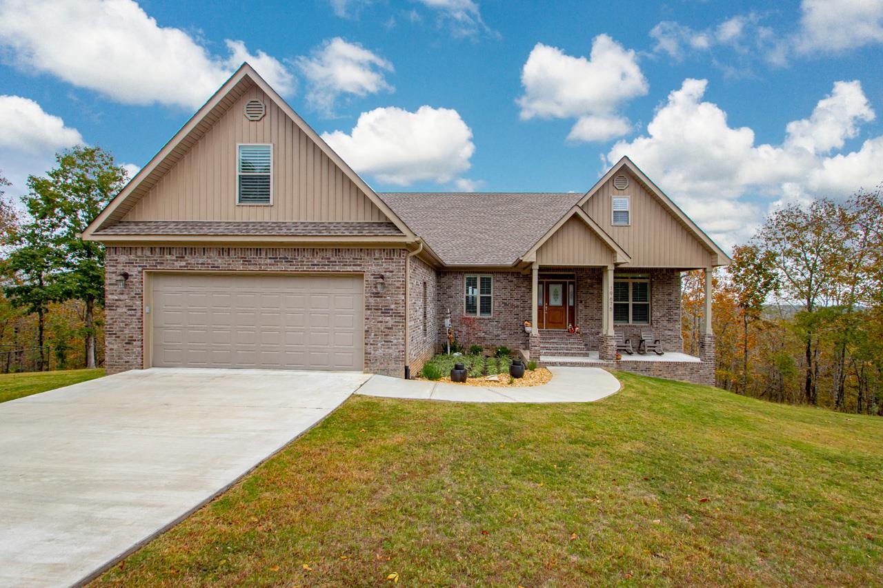 Rare opportunity ! 2019 Beautiful meticulous brick Home w 10.29 wooded Acres (2 Lots) w Amazing views, in Gated Subdivision w Stocked Pond & Pavilion! End of the Road Privacy w Wall of Windows & Lg Screened Porch to Enjoy Woods Wildlife & Vista View! Enjoy the Ambiance on the Lg Covered Front Porch w New Landscaping & Sounds of new Water Features! Open Concept w 10' Ceilings~Split Floor Plan~Lots of Natural Light~Quartz Countertops~Extensive Trimwork~New $6k Plantation Blinds! 13X26 Floored Workshop