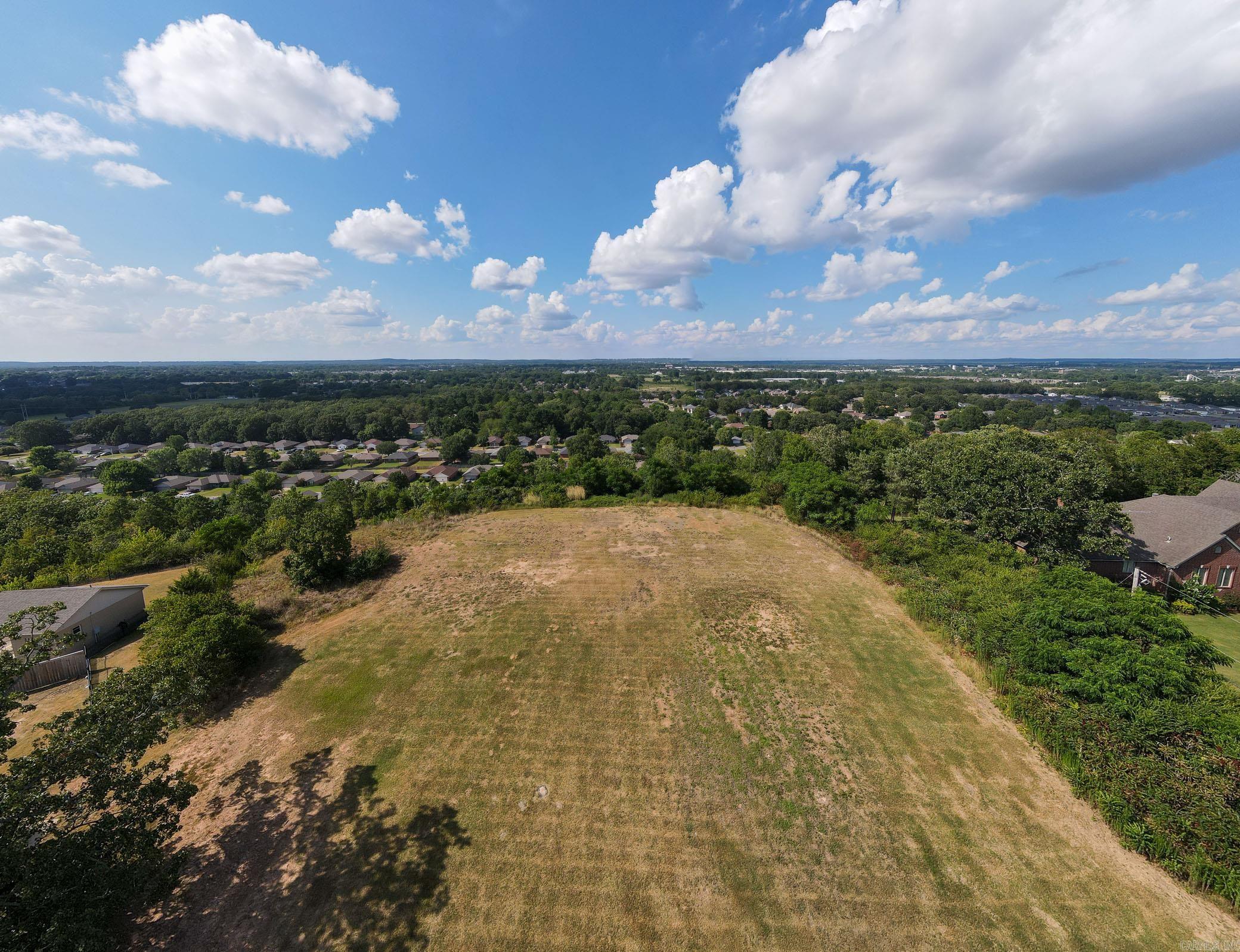 Image waking up every morning to breathtaking views of Conway from your future dream home! This builder-ready residential lot offers a rare opportunity to create your perfect living space, complete with the convenience of city utilities and sewer. This property is minutes from shopping and dining and has easy access to Interstate 40. Whether you're planning a modern retreat or a timeless estate, this lot provides the perfect canvas. Opportunities like this don't come around often-secure your slice of Conway before it's gone!