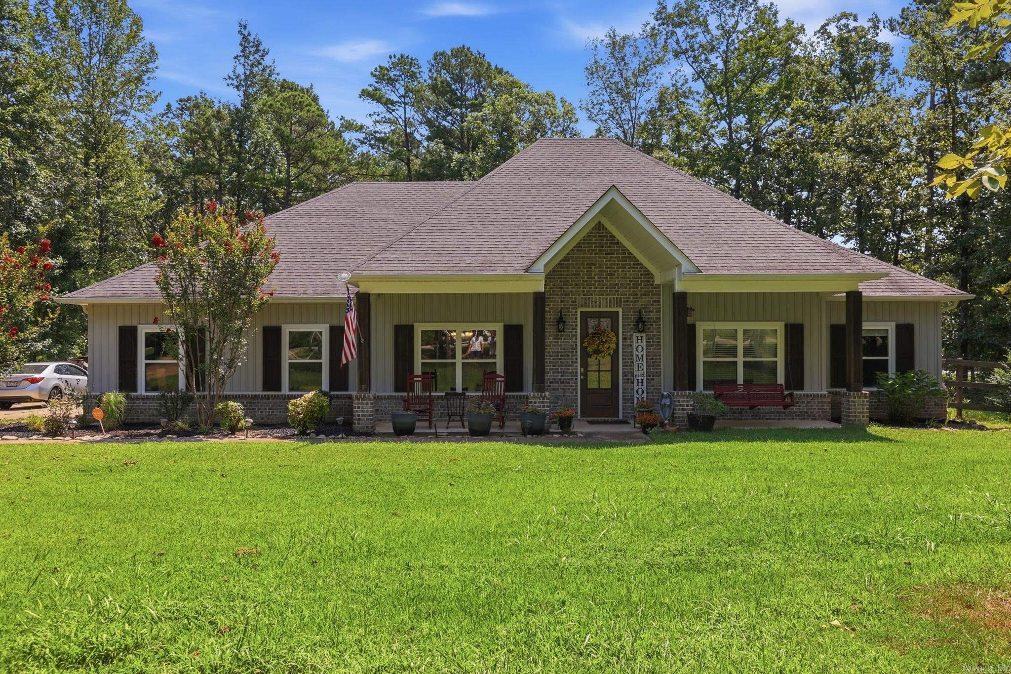 Must-see! Imagine coming home to peace and quiet, with the city still just minutes away. This 4 bed, 2 bath home gives you room to breathe: wood floors underfoot, a big open kitchen for morning coffee, and a cozy breakfast nook plus real dining space for family dinners. Unwind in a master suite built for relaxing, complete with a soaking tub. Kids or guests get their own wing. Then step out to 1.5 fenced acres, perfect for cookouts, kids, pets, and more.