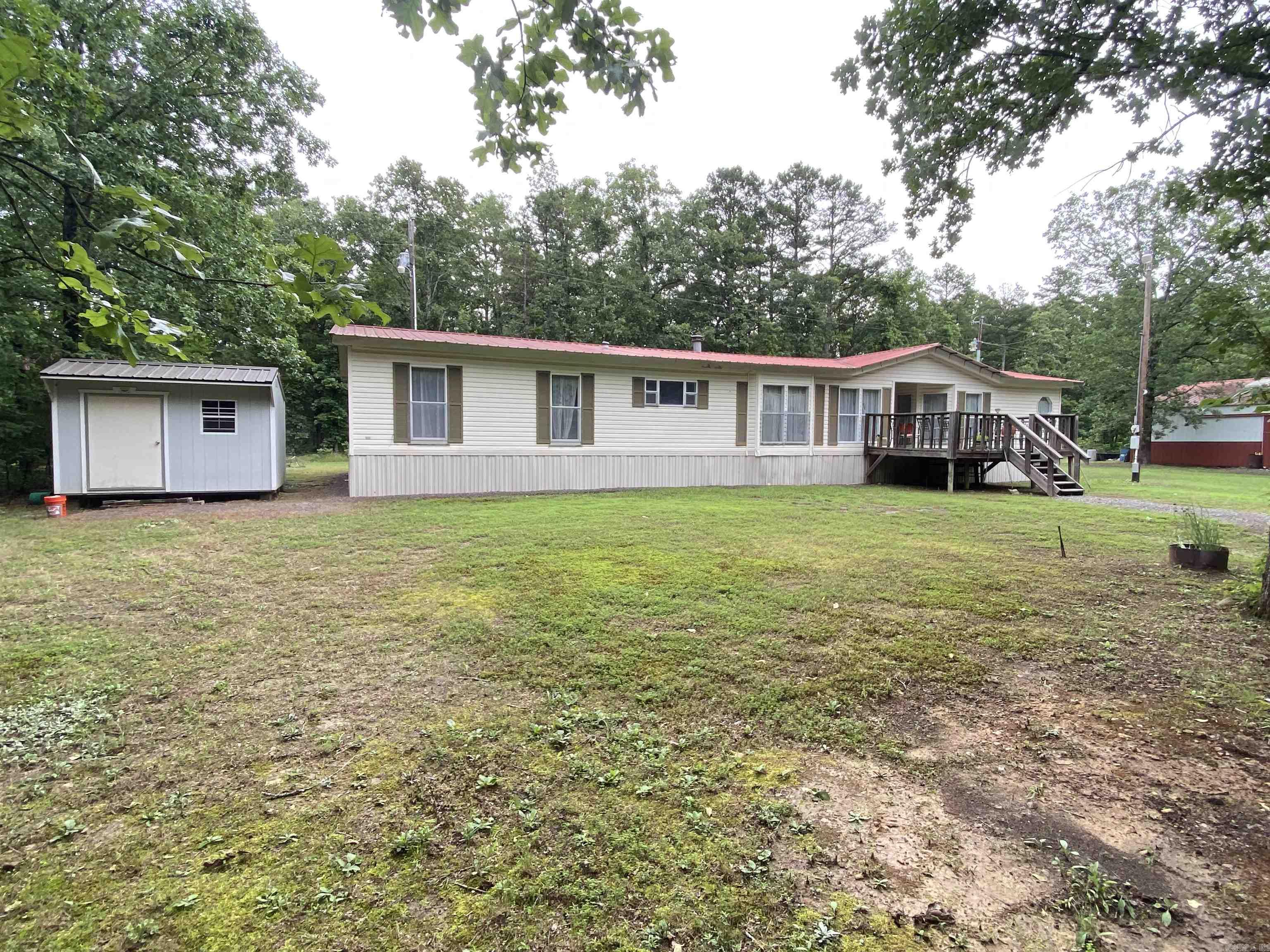 2,128 square foot, 4 bedroom, 2 bath manufactured home with a 30 x 40 shop. Located between Mill Creek and Sugar Loaf Parks. Home being sold with some furniture. Would make a great weekender or a full time home. Give us a call for a tour today. Acreage is approximate.
