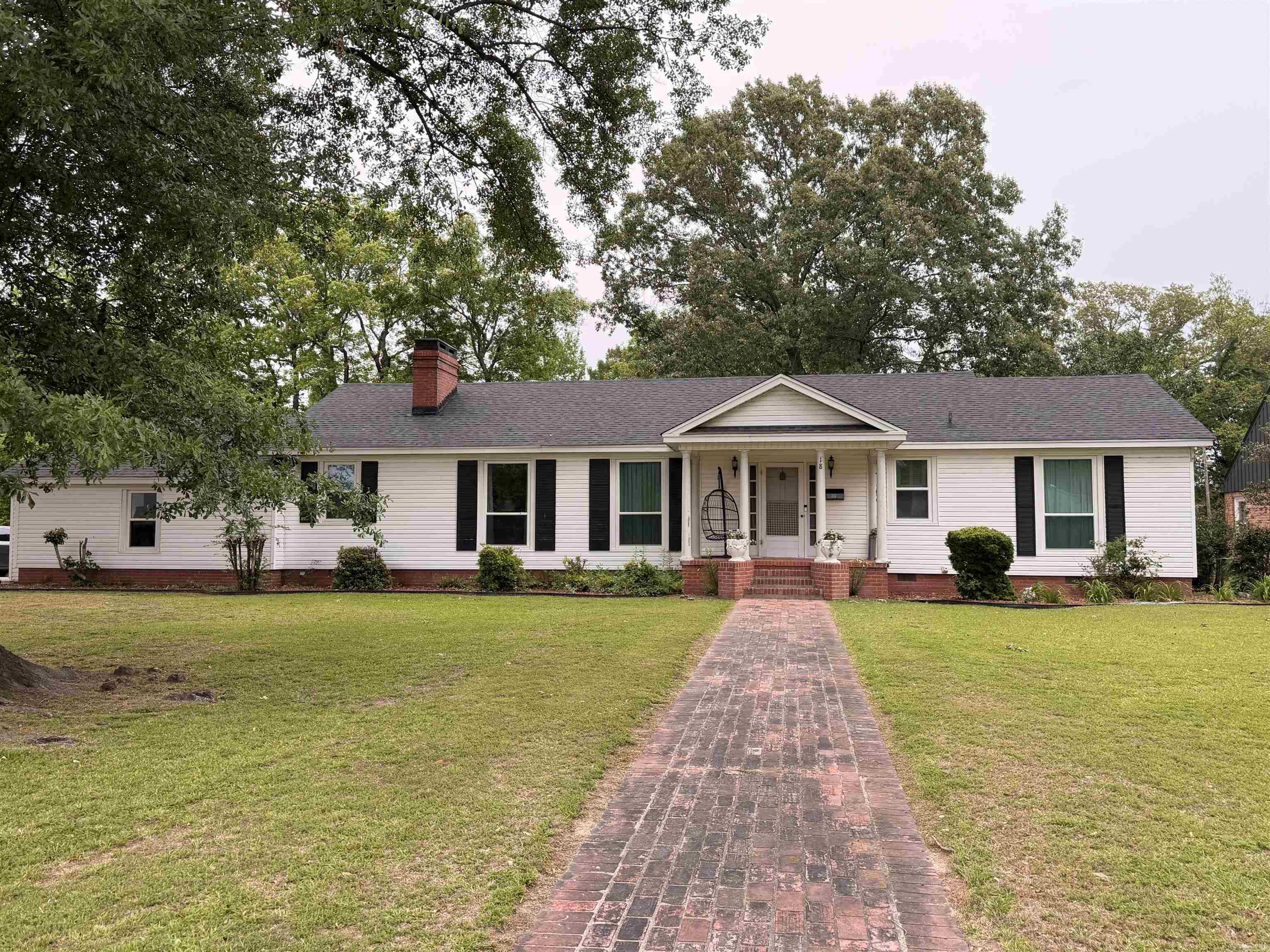 Charming Handicap-Accessible 2 Bedroom/2 Bathroom well maintained home in the heart of McGehee, AR.  This property offers comfortable convenient living with thoughtful updates and features designed for ease and accessibility.  Recent improvements include whole home generator, new double pane windows for energy efficiency, a new roof and remodelled handicap accessible bathrooms.  The functional layout provides comfortable living areas, spacious bedrooms and two full baths.  Perfect as a retirement home, first home or accessible living option.  The home is has a beautiful back porch with ample room for a garden.  Siding for ease of maintenance. Schedule your private showing today and discover the comfort and convenience the McGehee home has to offer.