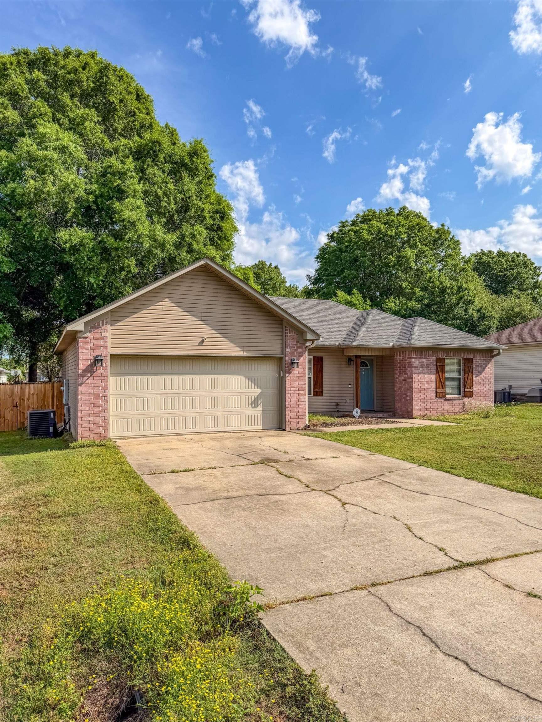 Cute 3 bedroom 2 bath home with a spacious living area with can electric fireplace, nice kitchen with granite countertops, split bedroom floor plan, primary suite is good size with nice walk-in closet, covered back patio and privacy fenced back yard.