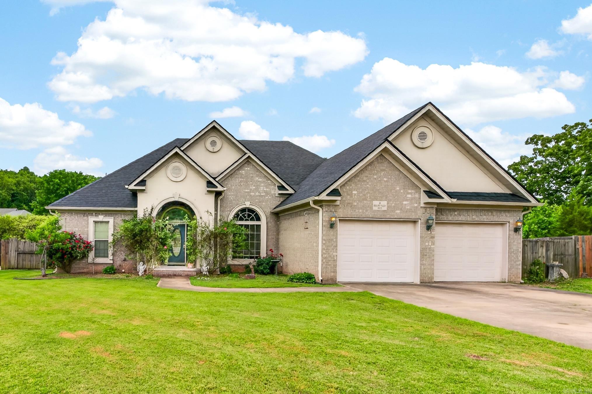 Located in the sought-after Greystone subdivision, this 4 bedroom, 2 bathroom home offers a desirable split floor plan and endless potential for the right buyer ready to make it their own. The spacious living room features a double-sided gas fireplace that also opens to the eat-in kitchen, creating a warm and inviting layout for everyday living and entertaining. The large primary suite includes a spacious bathroom with a jetted tub, walk-in shower, separate sink vanities, and a walk-in closet. Step outside to the covered back porch complete with a gas connection for a grill and enjoy the fenced backyard with room to relax or play. This home is being sold as a fixer upper and priced accordingly, offering a great opportunity to add your personal touch in a desirable neighborhood.