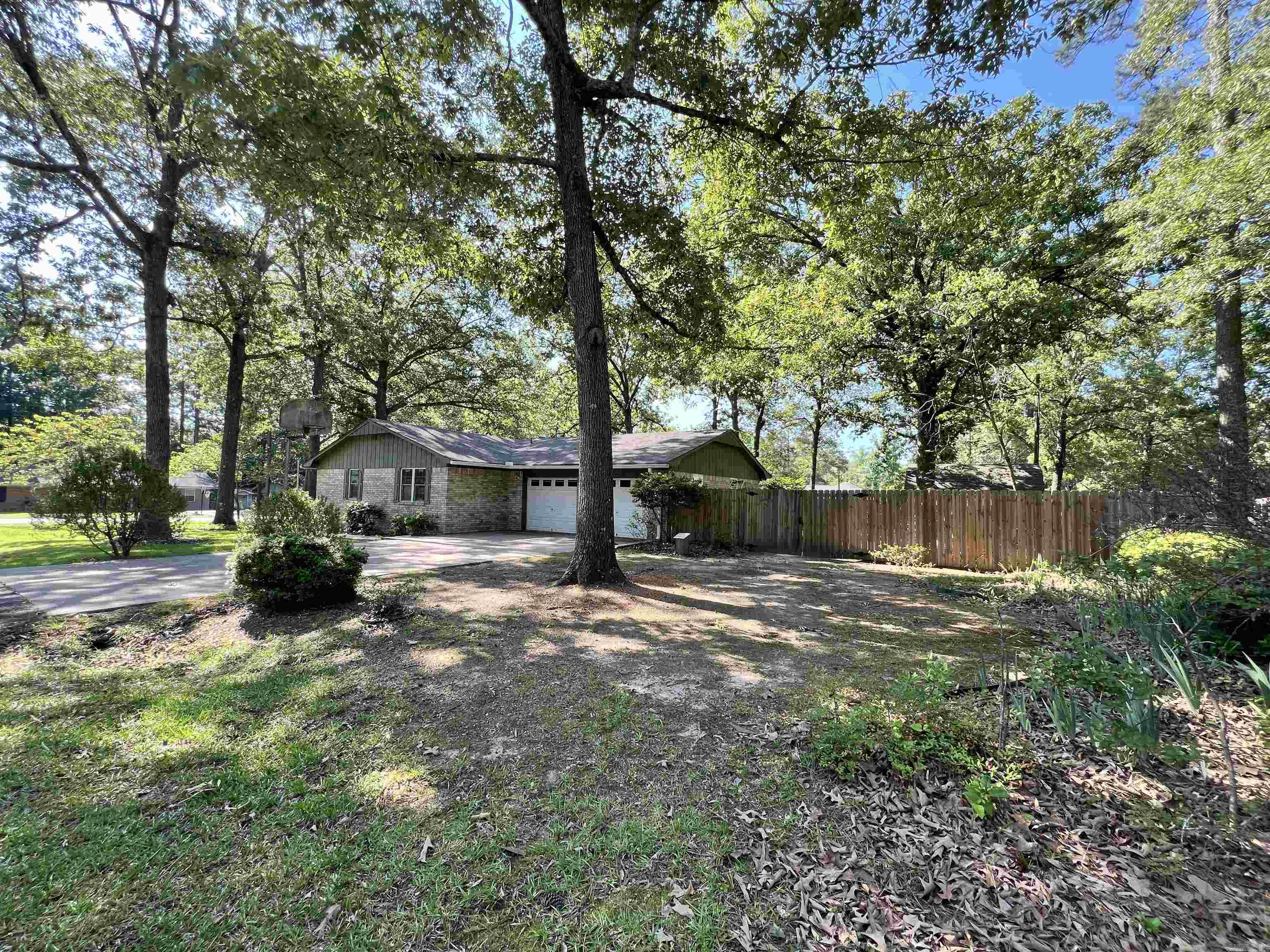 Completely updated and move-in ready, this inviting 3 bedroom, 2 bath home offers 1,812 sqft of comfortable living space with thoughtful upgrades throughout. Recent improvements include newer flooring, fresh interior paint, updated light fixtures with can lighting, new ceiling fans, and updated door hardware.  The kitchen has been beautifully refreshed with marble countertops, updated cabinet doors and hardware, a new sink and faucet, plus newer appliances including the stove and dishwasher. Both bathrooms have been extensively renovated with updated tile, lighting, toilets, and exhaust fans. The spacious primary bathroom features a stunning walk-in shower with beautiful navy blue tile accents.  Outside, enjoy the fenced backyard with a powered storage shed, a large open deck perfect for relaxing or entertaining, and mature landscaping that creates a peaceful outdoor setting. This home blends modern updates with warm, everyday comfort and is ready for its next owners to enjoy.