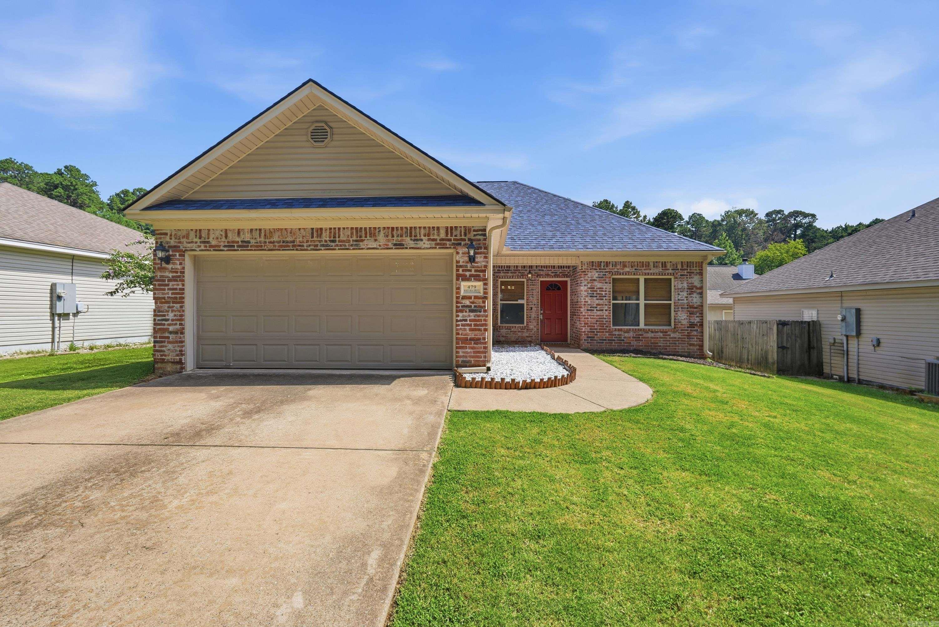 Move-in ready and full of updates! This well-maintained home features a brand-new architectural shingle roof, new HVAC system, beautiful wood-look flooring, and fresh paint, giving you peace of mind from day one. The spacious living room offers a tray ceiling, abundant natural light, and an open feel that's perfect for relaxing or entertaining. The kitchen features granite countertops, ample cabinet and counter space, and a functional layout that flows into the dining area. The split floor plan offers a private primary suite with a spacious bath and walk-in closet, while the additional bedrooms are generously sized. Outside, you'll appreciate the fully fenced backyard, the gazebo that conveys with the property, and the fresh landscaping that enhances the home's curb appeal. Don't miss this one!
