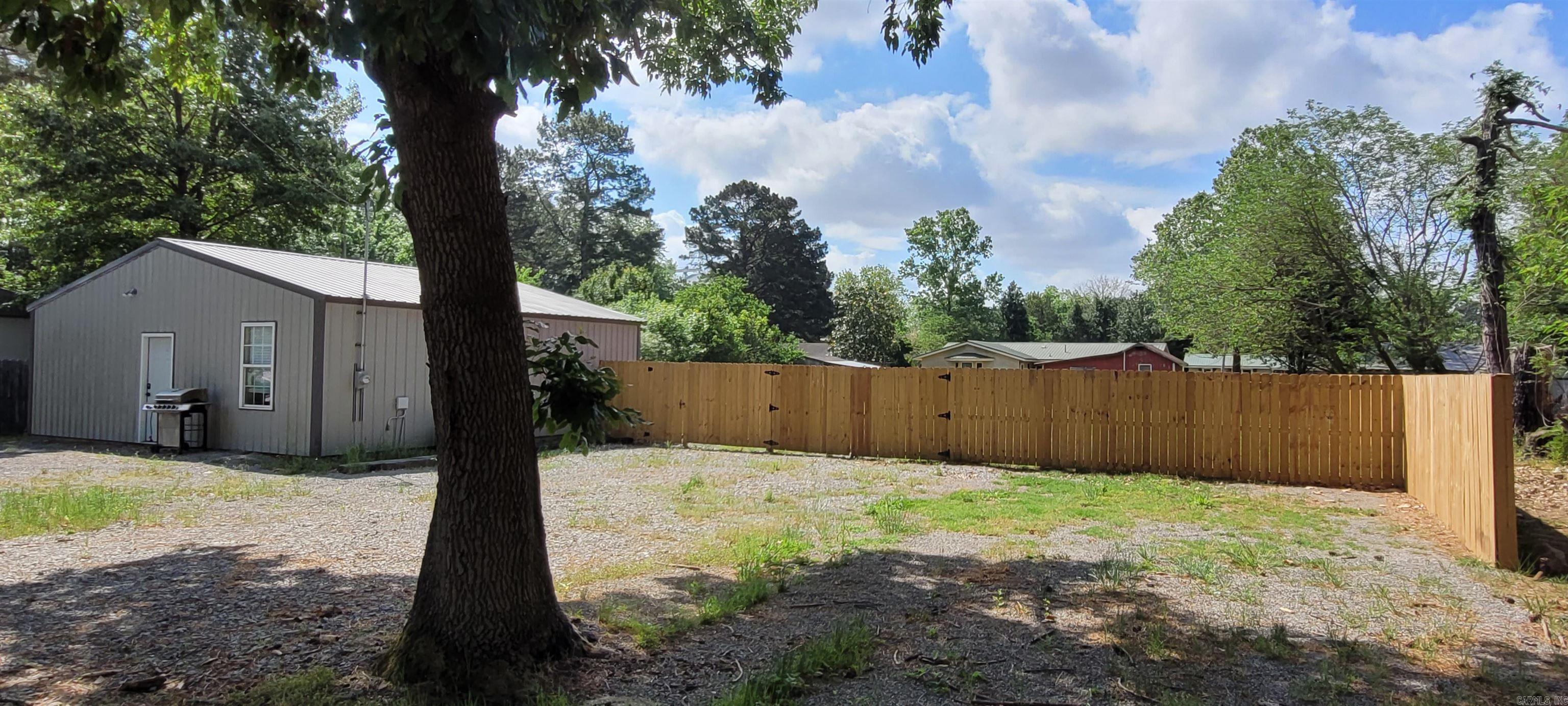 119 Beverly Street could be a primary residence, recreational or investment property. It is conveniently located within minutes of prime Arkansas hunting areas of Cache River National Wildlife Refuge, Hurricane Lake WMA, Rex Hancock Black Swamp WMA, Bayou Deview, and White River. The 2 bedroom, 1 bath lodge has an open main living area with laminate flooring, cedar accent wall and trim, and comes fully furnished with newer appliances including washer and dryer. The entire space is heated and cooled with an energy-efficient mini-split system. Exterior features include a large gravel parking area and privacy fenced back yard. *AGENTS SEE REMARKS