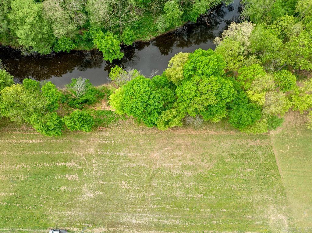 Perfect building spot in River Creek Subdivision offering gorgeous views of Big Creek, which flows into the nearby Little Red River. This private, secluded country setting provides an ideal place to build your dream home or weekend getaway cabin, with water and electric available at the road.