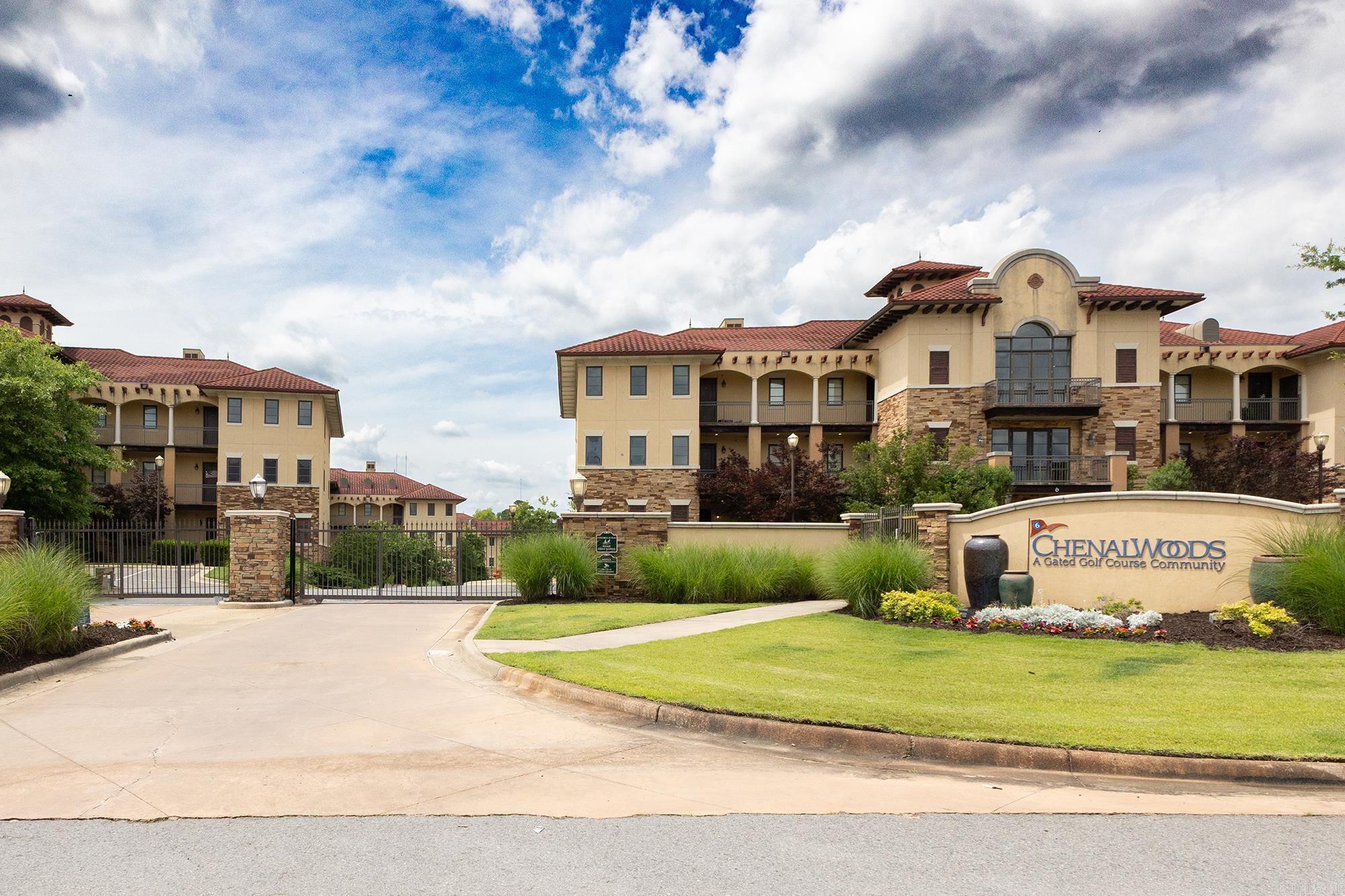 Check out this private ground floor- corner unit overlooking the 6th hole of the Founders Course of Chenal Country Club. This open concept unit boasts 3 generous bedrooms and 2 bathrooms. The Kitchen features a breakfast bar, granite countertops and high end ss appliances. This open floor plan condo features 2 large covered patios totaling 255square feet not included in square footage, wet bar, solid doors, crown molding, ample storage, gas fireplace, 9' ceilings and is move in ready! The primary bathroom features a jetted soaking tub, walk in shower and walk in closet. Condo amenities include a resort style salt water pool with TV, exercise room, putting green, clubhouse with outdoor kitchen with ss grill, eating area and fireplace, and is a short walk or drive to all that Chenal has to offer. You will find plenty of space in front of the building with surface parking- underneath behind a gated entrance you will find one assigned parking spot close to the elevator with 2 smaller secure storage units perfect for golf carts.