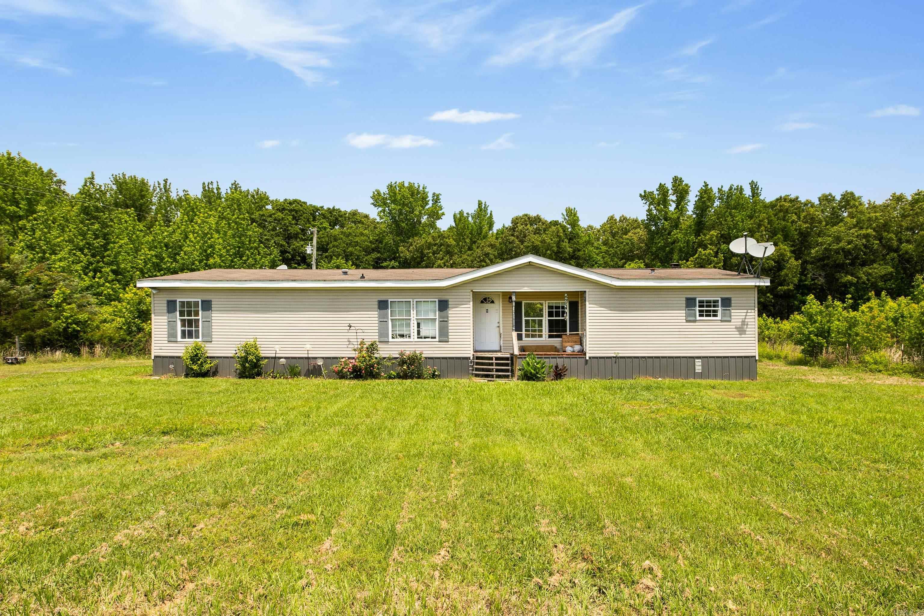 Welcome to 26 Cato Fire Station Road! This 3-bedroom, 2-bathroom mobile home is tucked away at the very end of Cato Fire Station Road, giving you all the peace and quiet you could ask for on 3.76 beautiful acres. This property provides plenty of room for a big garden, livestock, or that workshop you’ve always wanted, all while being surrounded by your own private wooded retreat.  The HVAC was replaced in 2021 and the home was affixed to a permanent foundation in 2023.