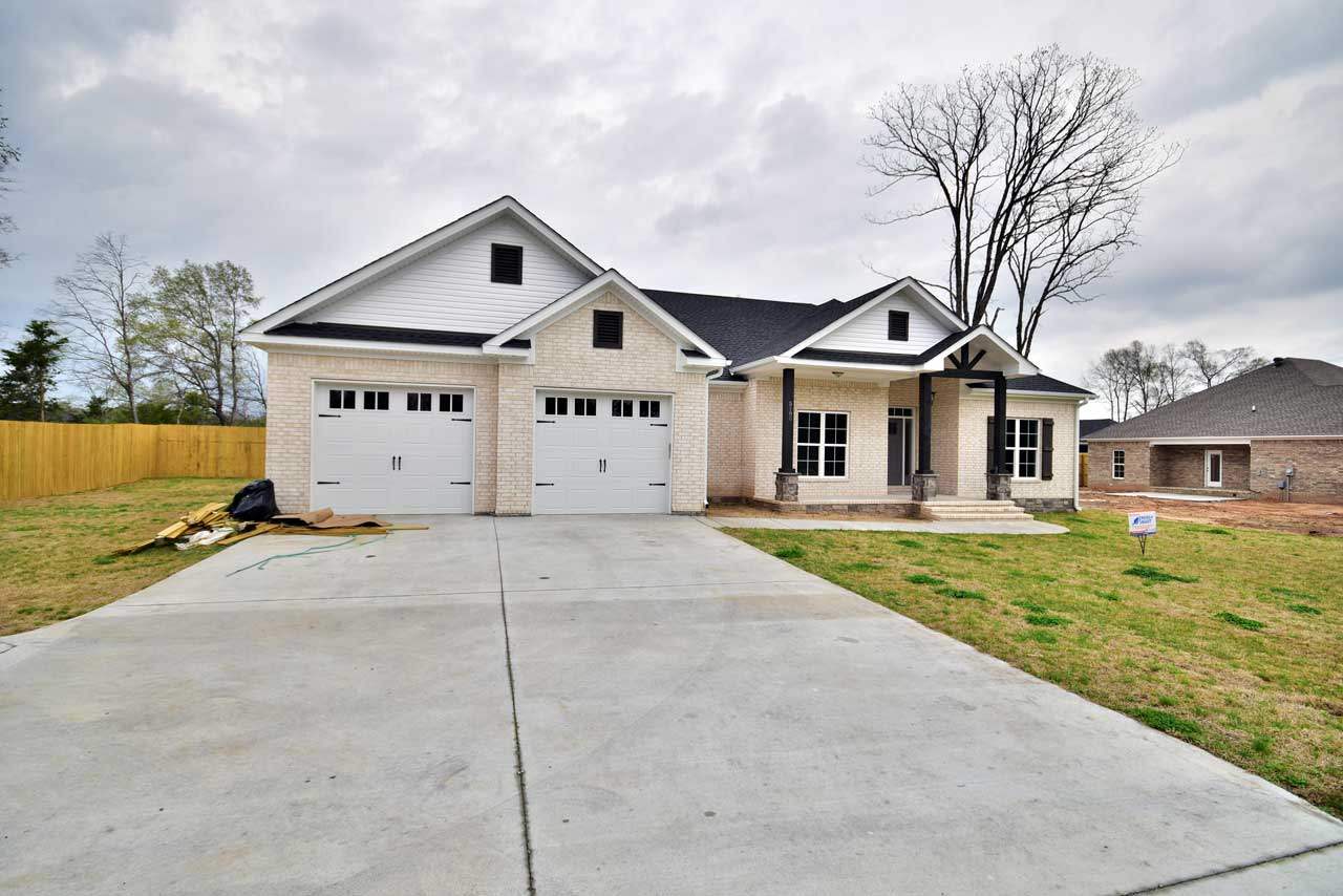 GORGEOUS NEW CONSTRUCTION HOME. FOUR BEDROOMD AND THREE FULL BATHS. FOURTH BEDROOM HAS ITS OWN EN SUITE BATH AND CAN BE USED AS A MOTHER IN LAW QUARTERS. OPEN CONCEPT WITH A BEAUTIFUL FIREPLACE, SOLID WALNUT CABINETS THROUGHOUT HOME. GREAT STORAGE. TILED SHOWER IN MASTER, DOUBLE SINK IN HALL BATH. OPEN CONCEPT. ENERGY SMART HOME