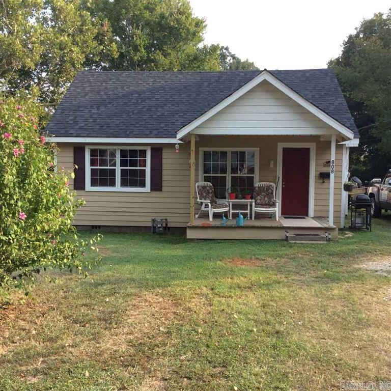 2Bed/1Bath home sits on almost 1 acre and features wood flooring, ship lap walls, and wood ceilings. Refrigerator, washer and dryer convey. This cute home is a great investment property, with plenty of room for your gathering in the backyard. Sold As-Is, and Seller is Motivated. Move-in ready, located minutes from Downtown Benton.