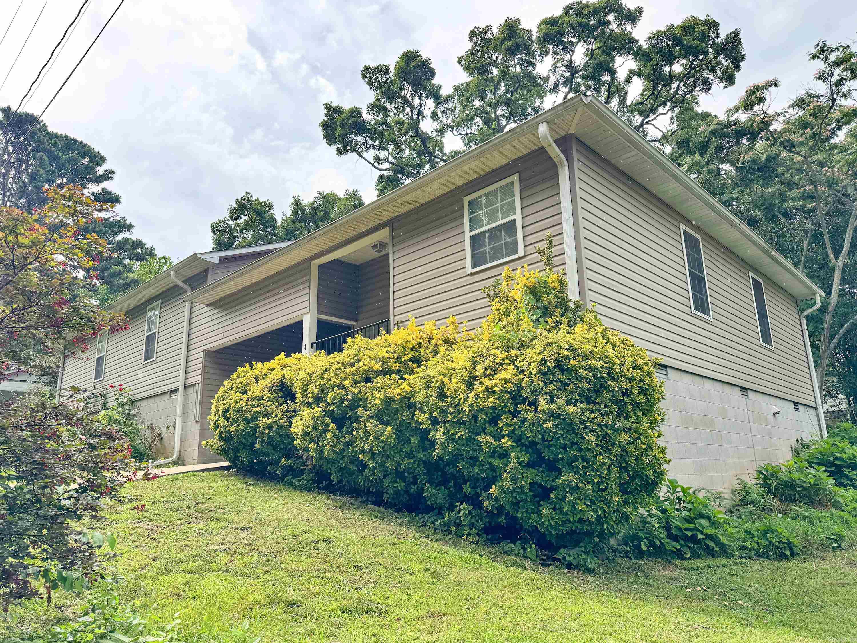 Very well-kept duplex in Heber Springs. This property is within walking distance to both Heber Springs High School and Spring Park. There are two boat ramps on Greers Ferry lake less than 5 miles away. Live in one side and use the other for income or mother-in-law quarters. One side fronts N 5th Street. It is 802sqft with 2 bedrooms, 1 bath and has an attached one-car garage. This primary side of the duplex has lots of nice built-in storage. The second side fronts W Clinton Street and has an attached carport with storage area. It is 728sqft with 2 bedrooms and 1 bath. Both sides have their own individual covered deck. There is also a shared steel storm shelter near the decks. Both units are vacant and ready for you to move in or rent out. Great income potential!