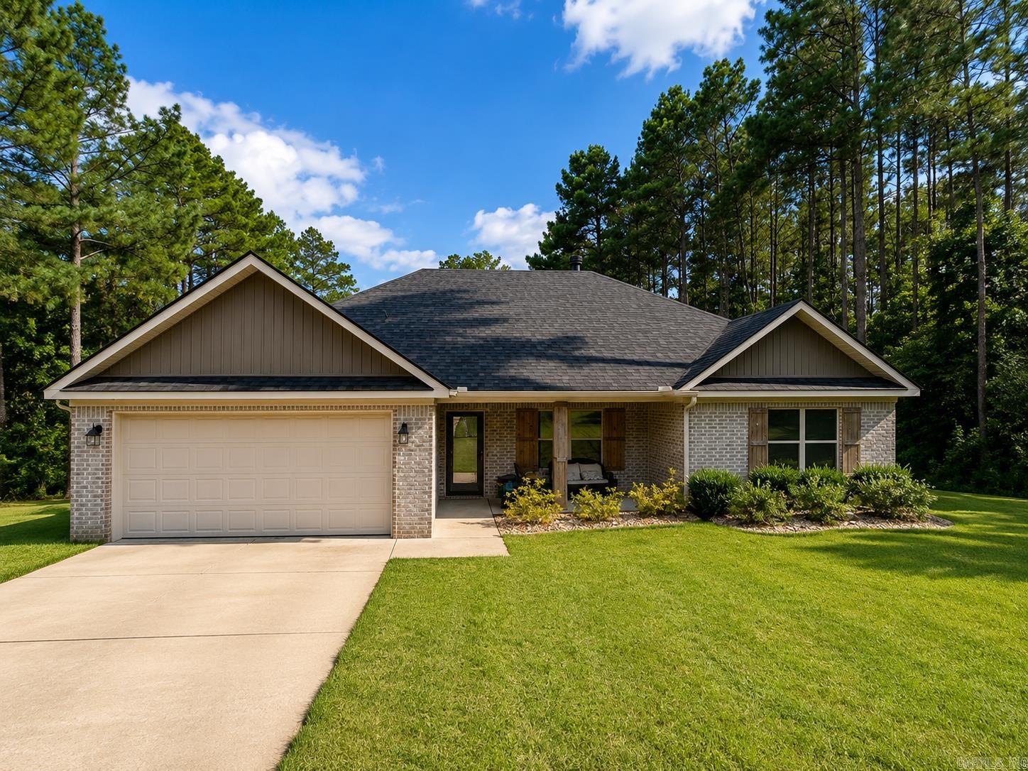 Beautiful home situated on a spacious lot with plenty of room to enjoy the outdoors! This property features a large detached shop with an attached lean-to, offering excellent space for storage, hobbies, equipment, or recreational vehicles. Inside, you’ll find an open-concept layout with granite countertops, abundant cabinetry, a breakfast bar, and a spacious dining area. The primary suite offers a double vanity, soaking tub, and generous walk-in closet. Step outside to enjoy the expansive backyard with mature trees that provide privacy and a peaceful setting.