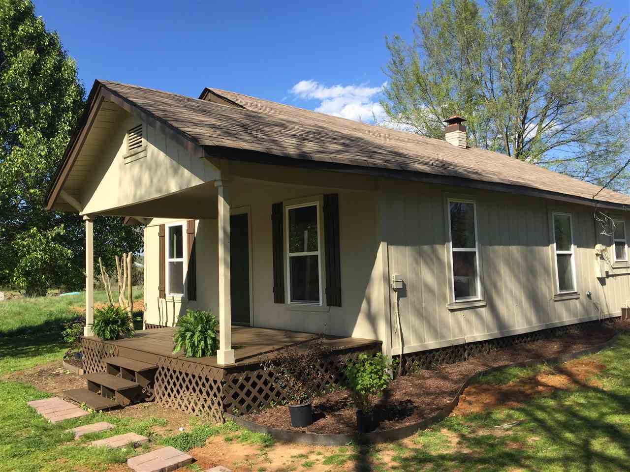 Nice, well maintained older home.   Beautiful hardwood floors in living room,  new paint inside and out, new carpet in bedrooms. Room in back can be converted into a bedroom or office space.  This home has new windows, new septic and extra insulation!! See Agent Remarks