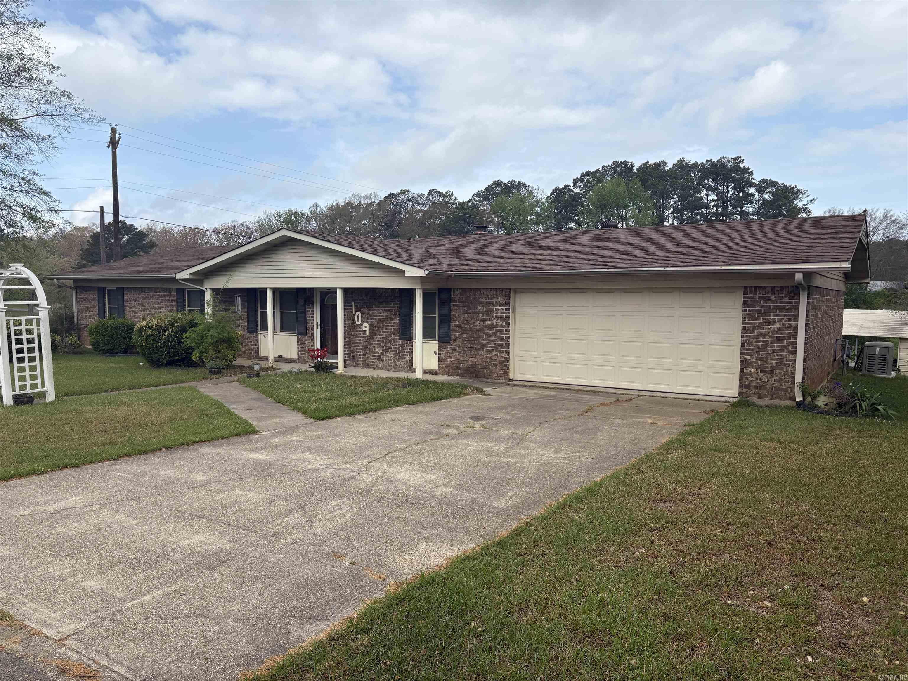 House to be sold AS-IS.  Great location! 3 bedrooms, 2 bath, 2 car garage, fireplace, separate storage building, generator and more.