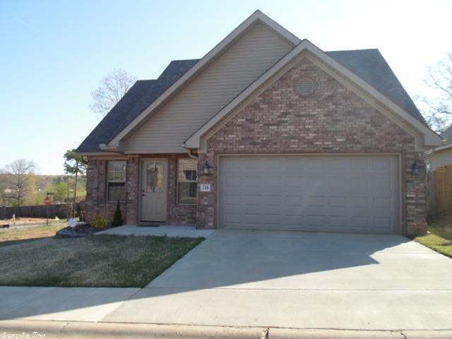 Laminate floors, spacious kitchen with granite counter tops - tile floors-- utility room, 2 car garage-- wrap around deck in back yard -- custom blinds both upstairs and down-- spacious attic upstairs-- landscaped yard.-----  Rural Development