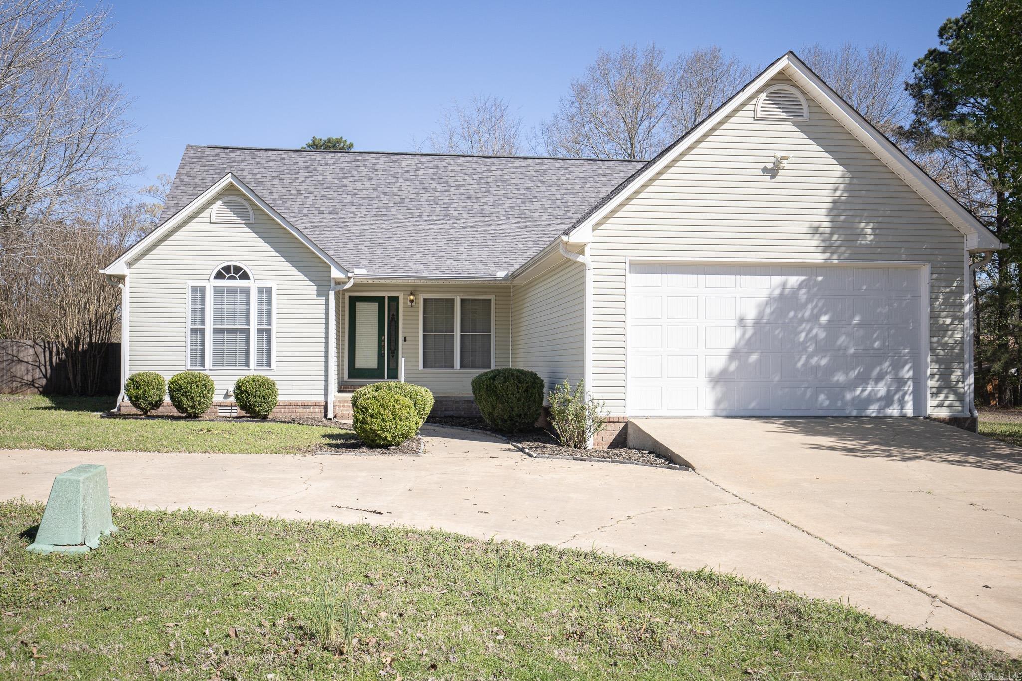 Welcome Home to 7 Christen Ln! This inviting home features beautiful hardwood floors, a cozy gas fireplace and stainless steel appliances in the kitchen. All bedrooms offer new carpet and large windows that bring in plenty of natural light. The spacious primary suite includes a double vanity, his and her closets, and a relaxing soaker tub. Several built ins and multiple storage closets that you don't find in new construction homes these days. Outside, enjoy a beautiful deck overlooking a fenced backyard. The property also includes a 16x20 shop with a window unit providing a perfect a place for hobbies or a workshop.