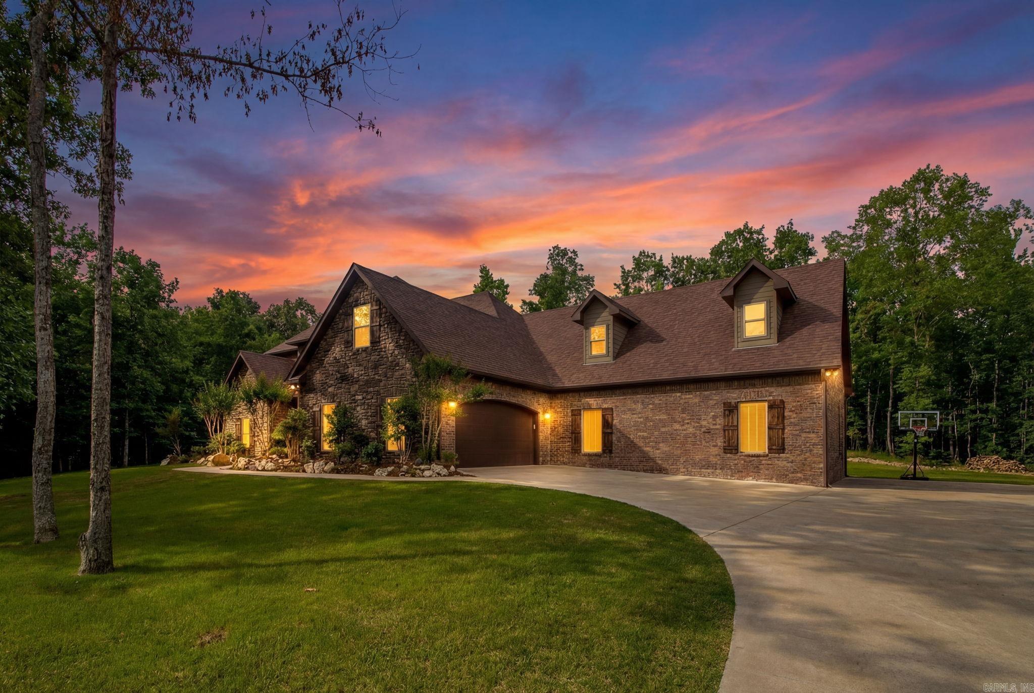 Welcome to this beautifully updated home in the prestigious gated Westcliffe subdivision of Little Rock, offering space, privacy, and versatility on 3 scenic acres. This stunning property features 4 bedrooms and 3.5 bathrooms with a layout designed for both comfortable everyday living and effortless entertaining. Inside, you’ll find stylish updates throughout, generous living spaces, and abundant natural light. The main living areas flow seamlessly, creating an inviting atmosphere perfect for gatherings or quiet evenings at home.  A standout feature of this home is the two oversized bonus rooms, giving you endless possibilities — create the ultimate media room, game room, home gym, office, playroom, or a combination that fits your lifestyle.  Enjoy the peace and security of gated living while still being conveniently located near shopping, dining, and top amenities. With acreage, updates, and flexible space, this Westcliffe gem offers the rare blend of luxury, function, and room to grow!