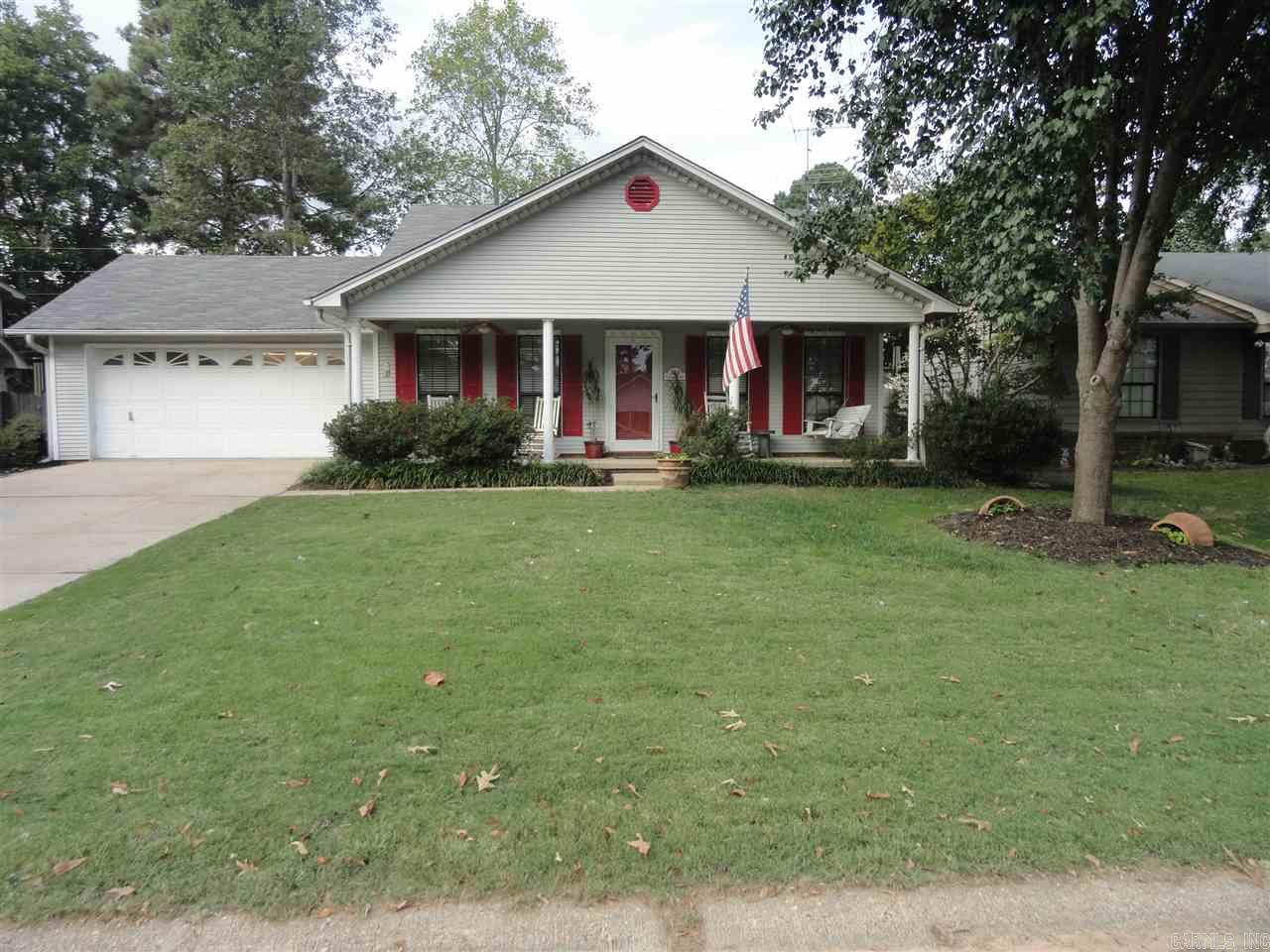 Fabulous 3 bedroom 2 bath in a well established subdivision.  Vaulted ceiling in great room gives a very spacious feeling. Beautiful hardwood flooring in great room,dining,and kitchen.  Master bedroom to die for!!! Home lives large!! There is a workshop area in the garage.  Outside you will find a pergola, dog run, and a storage building.  Don't let this one get away.  Call for an appointment today!!!