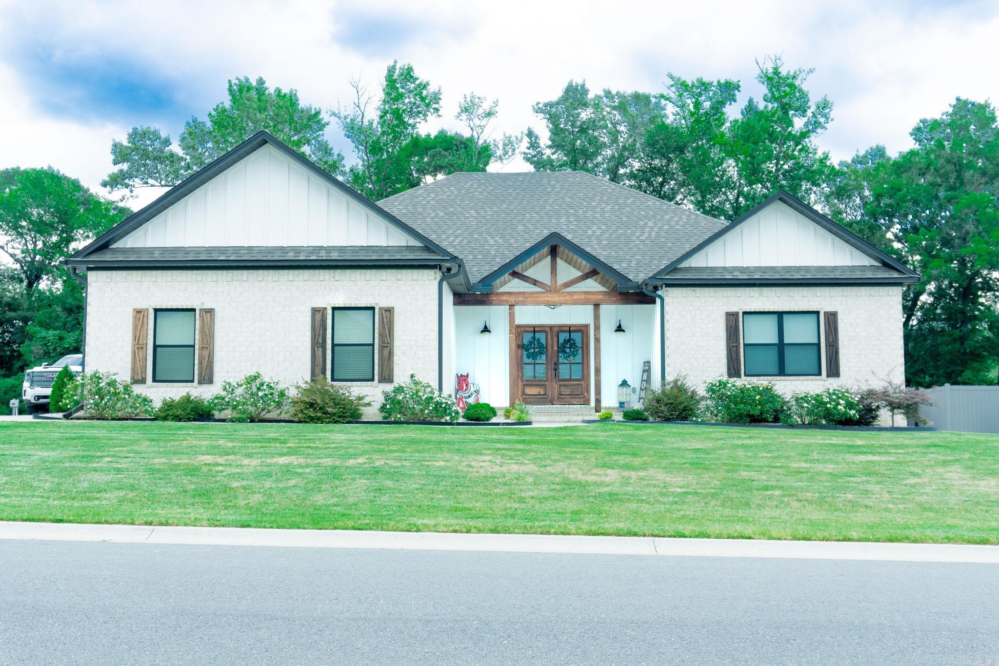 This impeccably maintained 2427 sq ft home offers the prefect blend of luxury, comfort & functionality. The moment you step inside, you'll appreciate the thoughtful design & exceptional attention to detail. The spacious living features a soaring vaulted ceiling, creating a bright & inviting gathering space that flows seamlessly into the heart of the home - a spectacular chef's kitchen complete w/abundant cabinetry, gorgeous granite, double oven & an oversized island w/breakfast bar perfect for entertaining. Just off the kitchen you'll find a beautifully appointed butler's pantry featuring additional storage, wine cooler & microwave. The primary is a true retreat, showcasing an oversized room & an expansive ensuite bath w/double vanity, makeup vanity, luxurious soaker tub, sep toilet area, large walk-in shower & oversized closet. Designed w/privacy in mind the split floor plan offers 3 generously sized guest bedrooms. Enjoy the covered patio, fully fenced yard, 30 x 30 Shop w/electricity & 2 car side load garage & wired for a generator. This immaculate home truly has it all - modern construction, upscale finishes, spacious living & exceptional outdoor amenities. IT'S A MUST SEE!