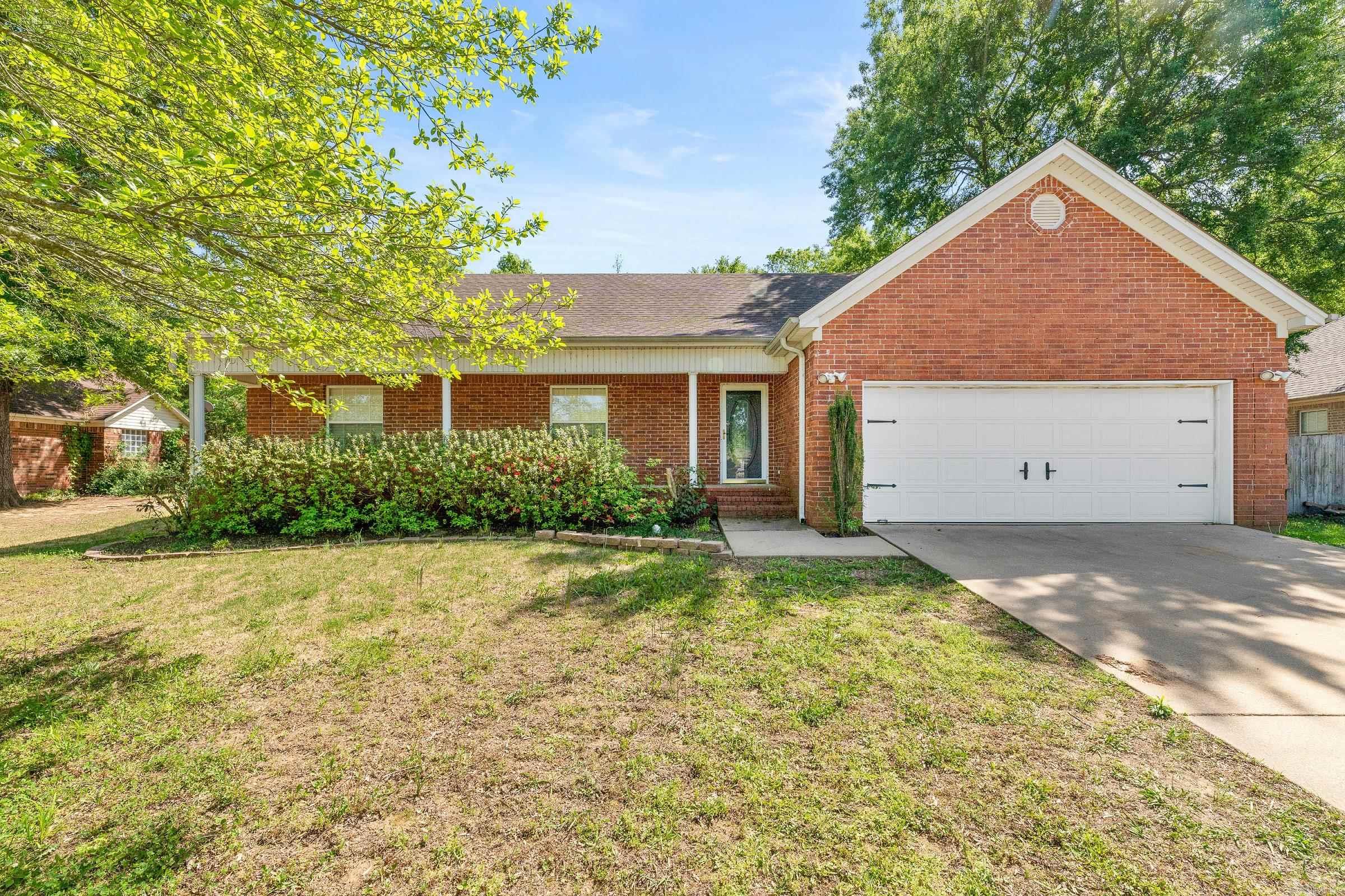 Looking for a one-story home with a layout that actually makes sense? You’ve found it! Don’t let the square footage fool you—this home offers an incredibly functional floor plan with spacious rooms throughout. The large kitchen has plenty of room for more than one chef, while the adjoining dining area can easily accommodate a farmhouse-style table for gatherings and everyday meals alike. The living room is generously sized with vaulted and tray ceilings, giving the space an open, airy feel with plenty of room for all the furniture, even the oversized sectional! If you’re tired of tiny secondary bedrooms, this home is a must-see. The guest rooms are oversized, with enough space for king-size beds if desired. The primary suite features a tray ceiling, walk-in closet, double vanities, and a brand-new shower/tub installation in the ensuite bath. Outside, enjoy an expansive backyard complete with a paved patio and privacy fence, perfect for relaxing or entertaining. Major updates include a new water heater installed February 2023 and a new roof in July 2023. Sellers are willing to do a $5000 flooring allowance with an acceptable offer.