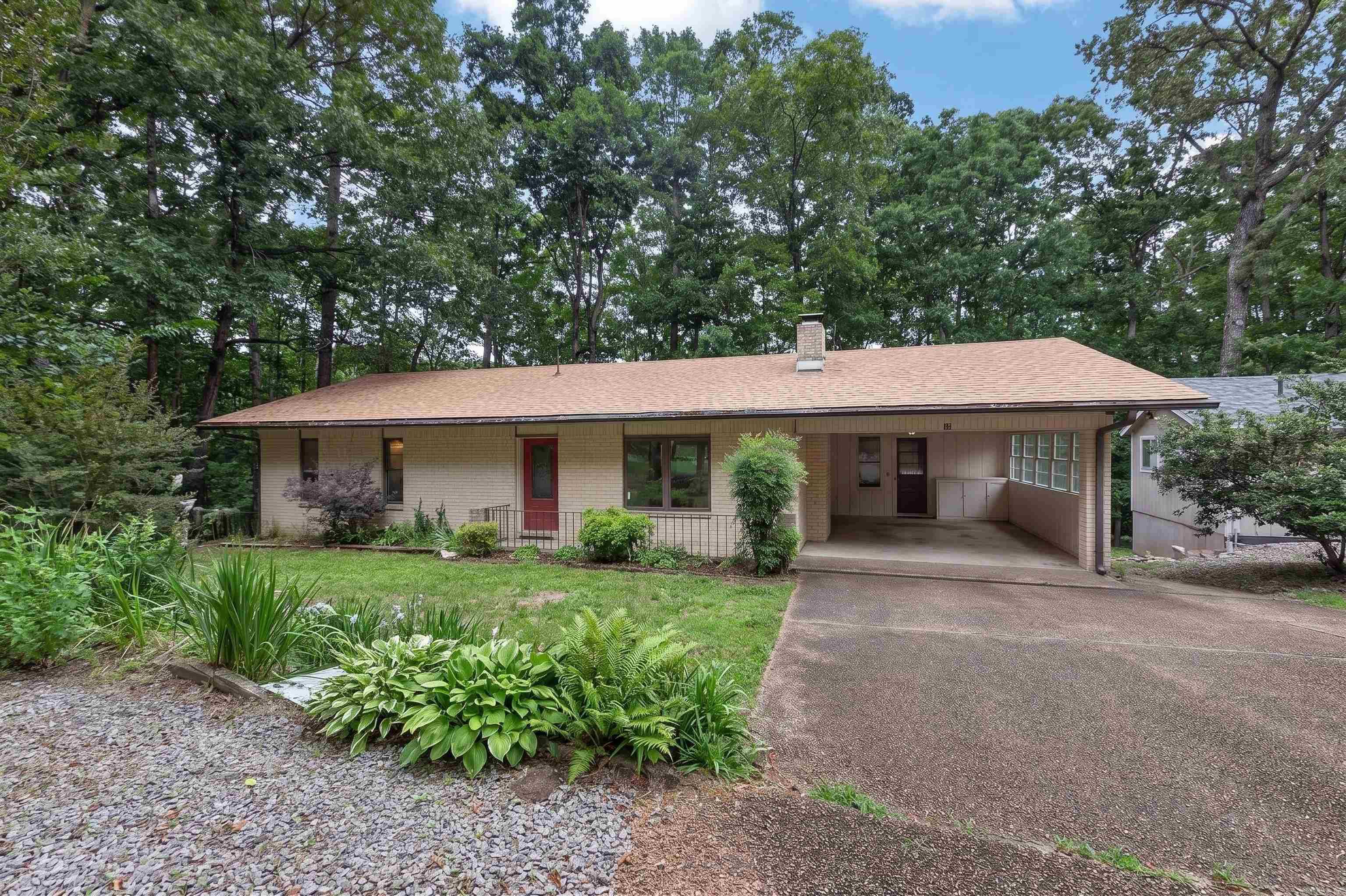 Opportunity awaits at 48 N. Badalona Drive! This brick walkout ranch offers great bones, a versatile floor plan, and plenty of potential for buyers to make it their own. Featuring a new roof in 2024 and furnace  2019. The home includes 2 bedrooms and 2 baths main floor, a spacious living and dining room combination, 2 Arkansas rooms- one off dining area with access to the deck and another adjoining the primary bedroom. The walkout lower level provides additional flexible space that can serve as a studio apartment, family room , guest quarters, hobby space or home office.  A one car carport adds convenience, while the west side location offers easy access to shopping. This property needs updating and is priced to reflect its condition, making it an excellent opportunity for investors, flippers, or buyers looking to add their personal touch and build equity. BRING YOUR VISION AND TRANSFORM THIS HOME INTO SOMETHING SPECIAL.  Court approval