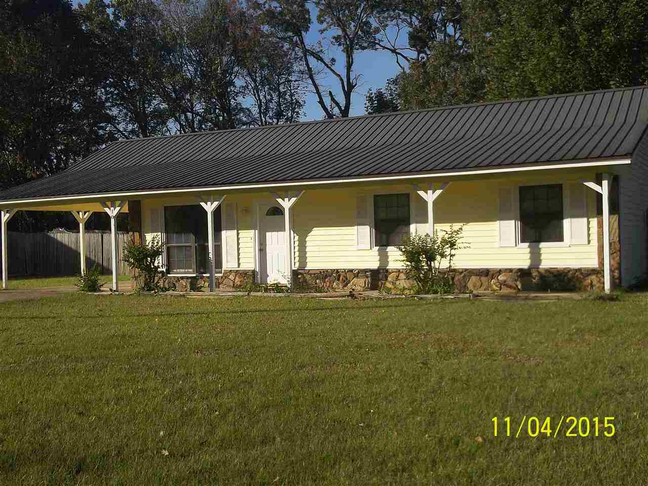 This is a great starter home or investment. Features 3 bdms, ceramic & laminate floors, metal roof, nice concrete patio in the back for entertaining along with very large back yard with privacy fence. New interior paint, along with a large laundry room. Call today for your viewing. Seller holds an active Real Estate license.