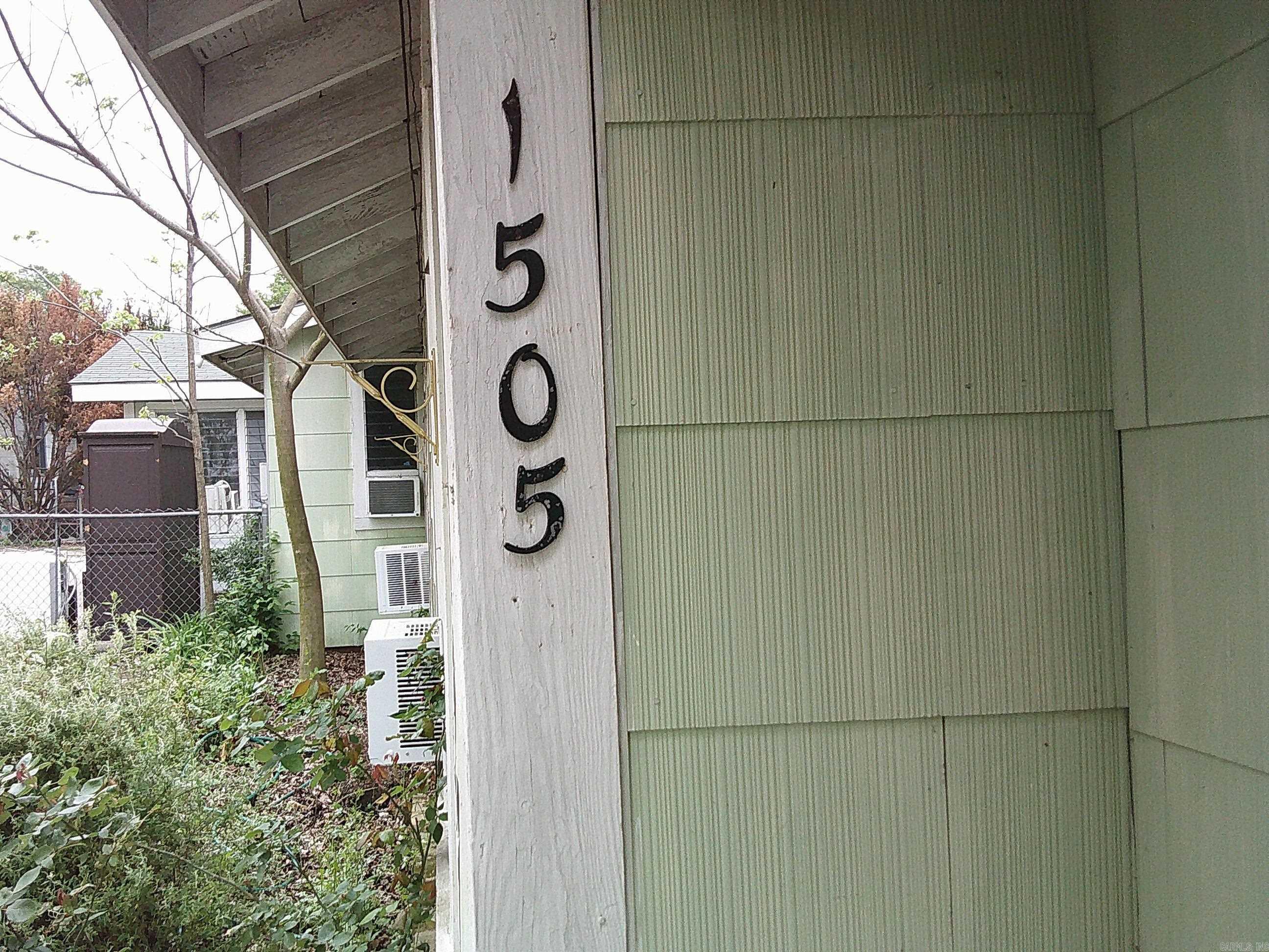 City duplex just a few blocks from Oaklawn Race Track. Easy rental income. Both sides have yards and off street parking. Pictures are of 1505 7th St. 429 Henderson St is currently occupied. Lot to the right of 1505 conveys.