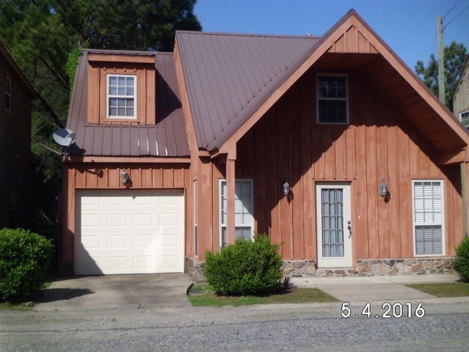 Wonderful home just steps from the Little Red River and world class trout fishing. Fully furnished 3Bedroom, 2.5Bath home has vaulted ceilings, granite counter-tops and like new appliances in the kitchen. There is a fireplace with gas logs, gas hookup on back patio for outdoor cooking and large enclosed one-car garage to store all your lake or river equipment. This move in ready home is close to all area amenities and could be a personal getaway or potential income property. Must see this one!!!