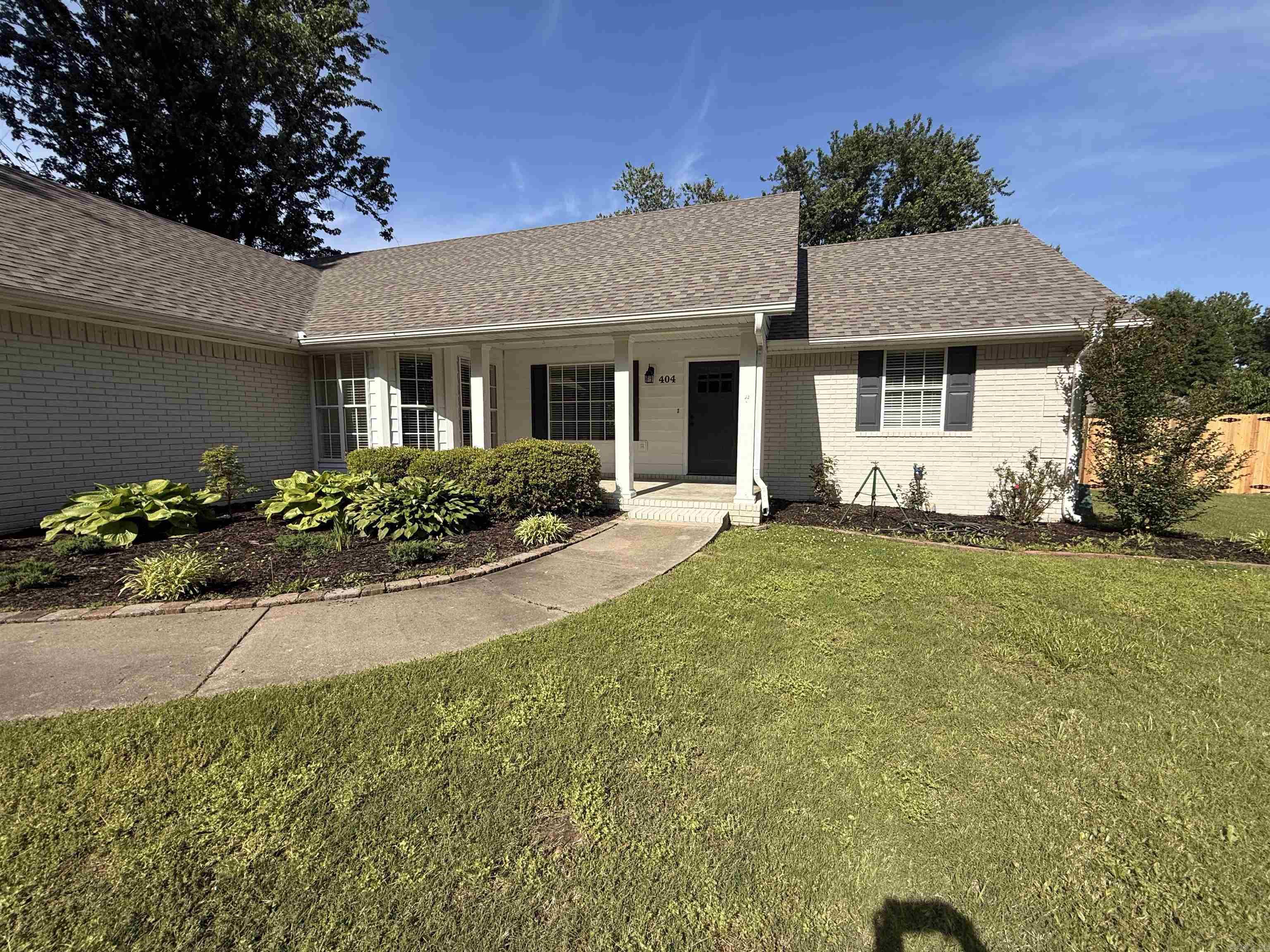 Beautiful 3BR, 2BA ranch-style home located in an established neighborhood near the library and senior center. Offering 2,204± SF on 0.35± acres, this move-in ready home features excellent curb appeal, mature trees, tasteful landscaping, fenced backyard, and a charming tire swing. Interior highlights include a spacious eat-in kitchen, formal dining room, comfortable sunroom, large primary suite, generous closet space, recently remodeled bath, and central heat and air. Brand new roof and well-maintained throughout. Built in 1995 and ready for its next owner to enjoy. Convenient central location with timeless appeal. SF acquired from seller, it includes headed and cooled sunroom. Sale is subject to owner confirmation. Property is being sold as a standard transaction and is not bank-owned or a short sale. Please contact agent for additional terms and conditions for auction.