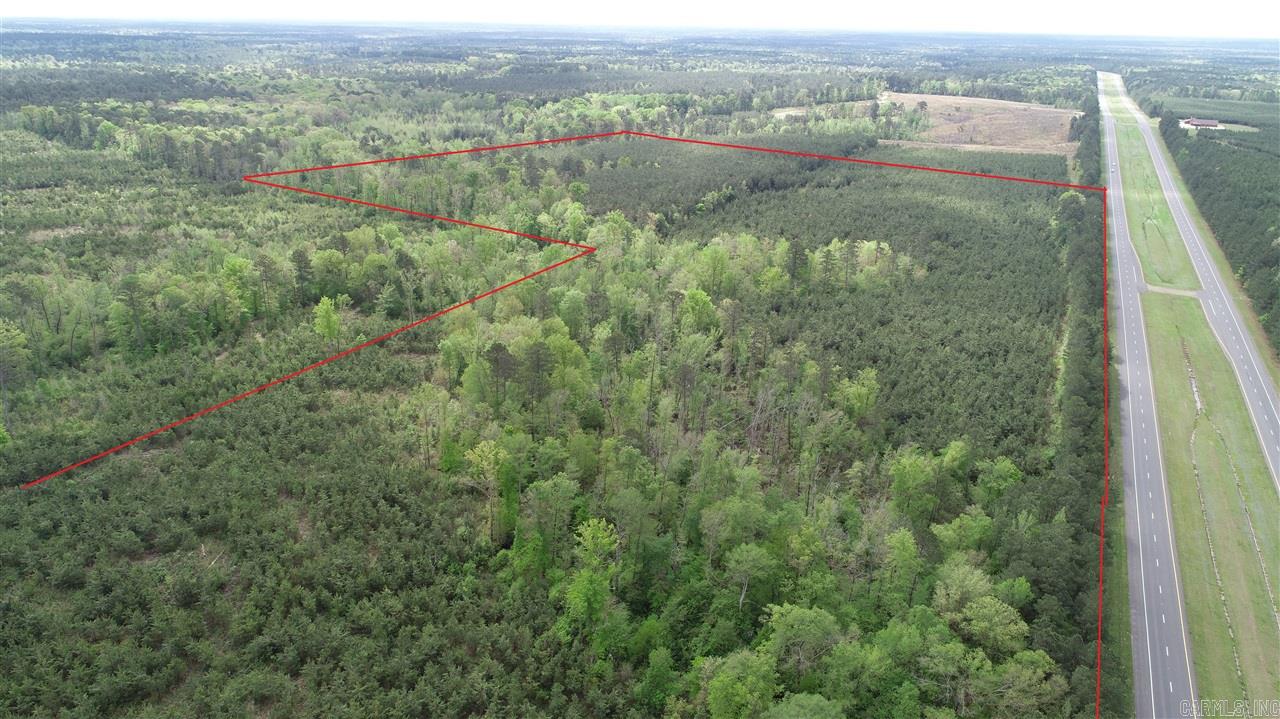 The AR-Hwy 7 East Tract (#03019-03772) is a +/- 77-acre (per GIS Estimation) tract of timberland located in southeastern Ouachita County about three miles north of Louann, AR (North 33.444869, West 92.798368). The topography consists mostly of well-drained rolling hills along with about 24 acres of bottomland. The upland portion features a diverse range of planted pine stands including ~16 acres planted in 2005, ~25 acres planted in 2014 and ~12 acres planted in 2017. North Fork Smackover Creek, a perennial stream flows through the property in a southeasterly direction. Access to the property is excellent with frontage to the eastern side of AR-Hwy 7, and the western side of County Road 65. Some utilities along these public roads allowing for camp/home site potential within the Camden-Fairview School District. According to the USDA NRCS web soil survey, the property is based upon an assortment of sandy loam soils which give the tract a weighted average site index of 84.2 feet for Loblolly Pine (base age 50). Whether you are looking for investment pine timberland or a recreational country retreat, these parcels offer a range of timber types to experience.    SEALED BID SALE - Due by