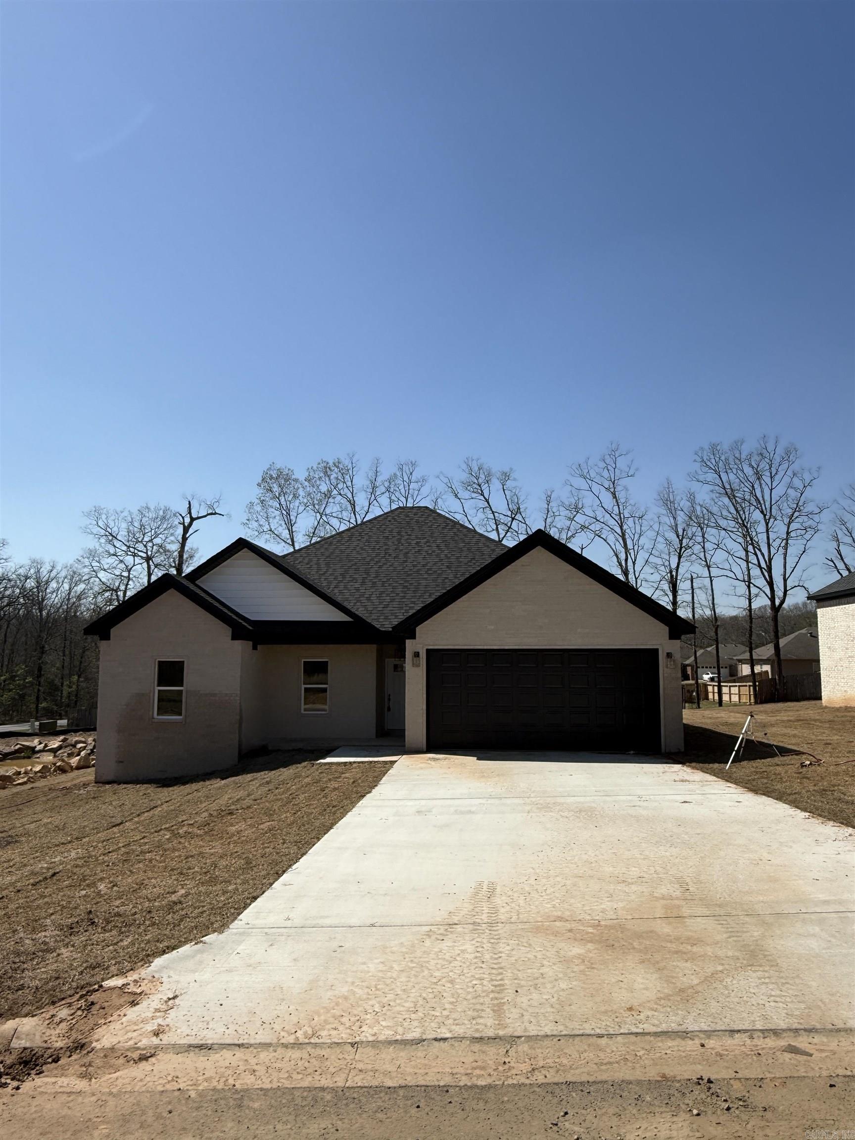 NEW CONSTRUCTION HOME! Located only 2-3 minutes from 67/167/I57 this new construction home in a new neighborhood is soon to be ready for a new family! This home is ideal for someone living & working in the greater Cabot area, commuting to LRAFB, commuting to Conway, commuting to Searcy or elsewhere! Entering the homes foyer you see the living room ahead of you w/9' tall ceilings. This is an open concept home w/a split floorplan. The kitchen, dining & living room provide an ideal home for entertaining & making memories! The Master Bed & Bath & Laundry are located on the right rear of home. Laundry connects to Master Bath making this easy to move clothes to your bedroom too! The other two bedrooms are located on the front left of the house as well as the guest bathroom being located in the left center of the home. These homes are fantastic homes for most all budgets whether a first-time home buyer, a first upgrade home or retirement home to downsize. Not to mention this home is also 3-minutes to the Cabot Schools Pre-K North and 9-minutes to Greystones Cypress Creek Golf Course too! Fantastic location & fantastic home! Do not miss out!  See Agent Remarks.
