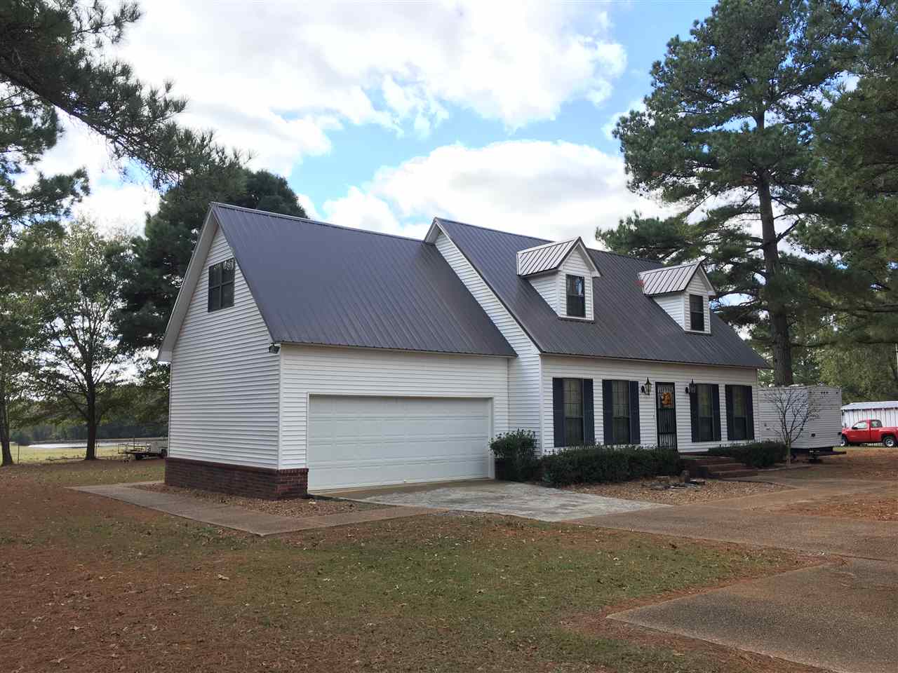 A beautiful, spacious 2-story home with a country-paradise view, 3 beds and 2 full baths with 2 unique bonus rooms that could be a handy office, a cozy nursery, or family room. You'll also find a 2-car garage, covered back patio for entertaining and relaxing, and a wired shop perfect for an extra vehicle, play, or hobbies. New metal roof & AC unit in 2013. To help buyers, seller is offering to pay up to $3,500 of Buyer Closing Costs!