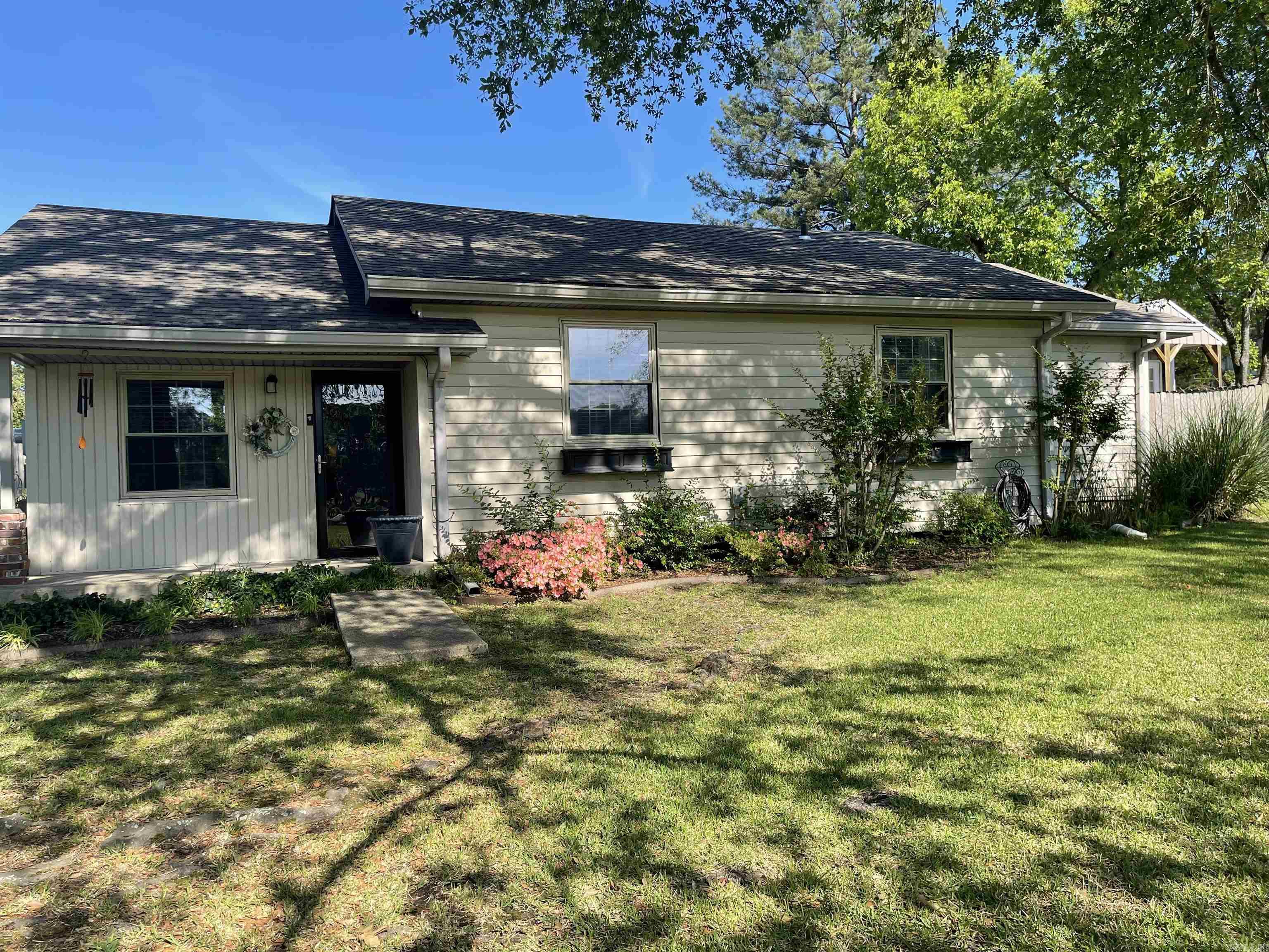 This is a dollhouse.  Three Bedrooms and two full baths.  Living Room has a fireplace.  Formal Dining Room and Kitchen comes with all appliances including Washer and Dryer.  Low traffic street and beautiful views.  Landscaping is beautiful and backyard is privacy fenced.
