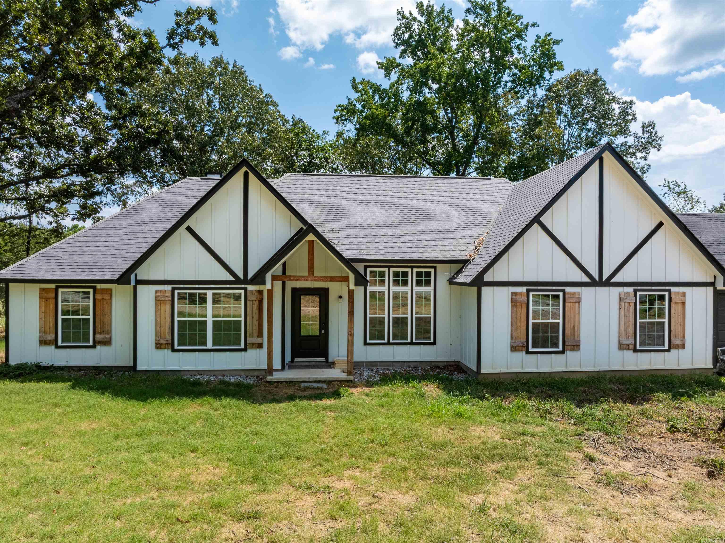Modern Country Living at Its Finest!!!  Discover the perfect blend of style, comfort, and space in this NEWLY BUILT 5-bedroom, 3-bath home on approximately 2 acres in the peaceful Bethesda area—just minutes from Batesville.  Step inside to an inviting entryway that flows into a formal dining room and an open-concept living room/kitchen—perfect for entertaining or everyday family life. The kitchen is a dream for the home chef, while the primary suite features a spa-like retreat with a walk-in shower, soaking tub, and generous walk-in closet.  Enjoy extra functionality with a bonus storage/pantry room, and take in the sweeping countryside views from your covered back porch—ideal for morning coffee or evening sunsets.  Here, you’ll enjoy the tranquility of country living without sacrificing quick access to schools, jobs, shopping, and the Batesville Community Center & Aquatic Center. See agent remarks.