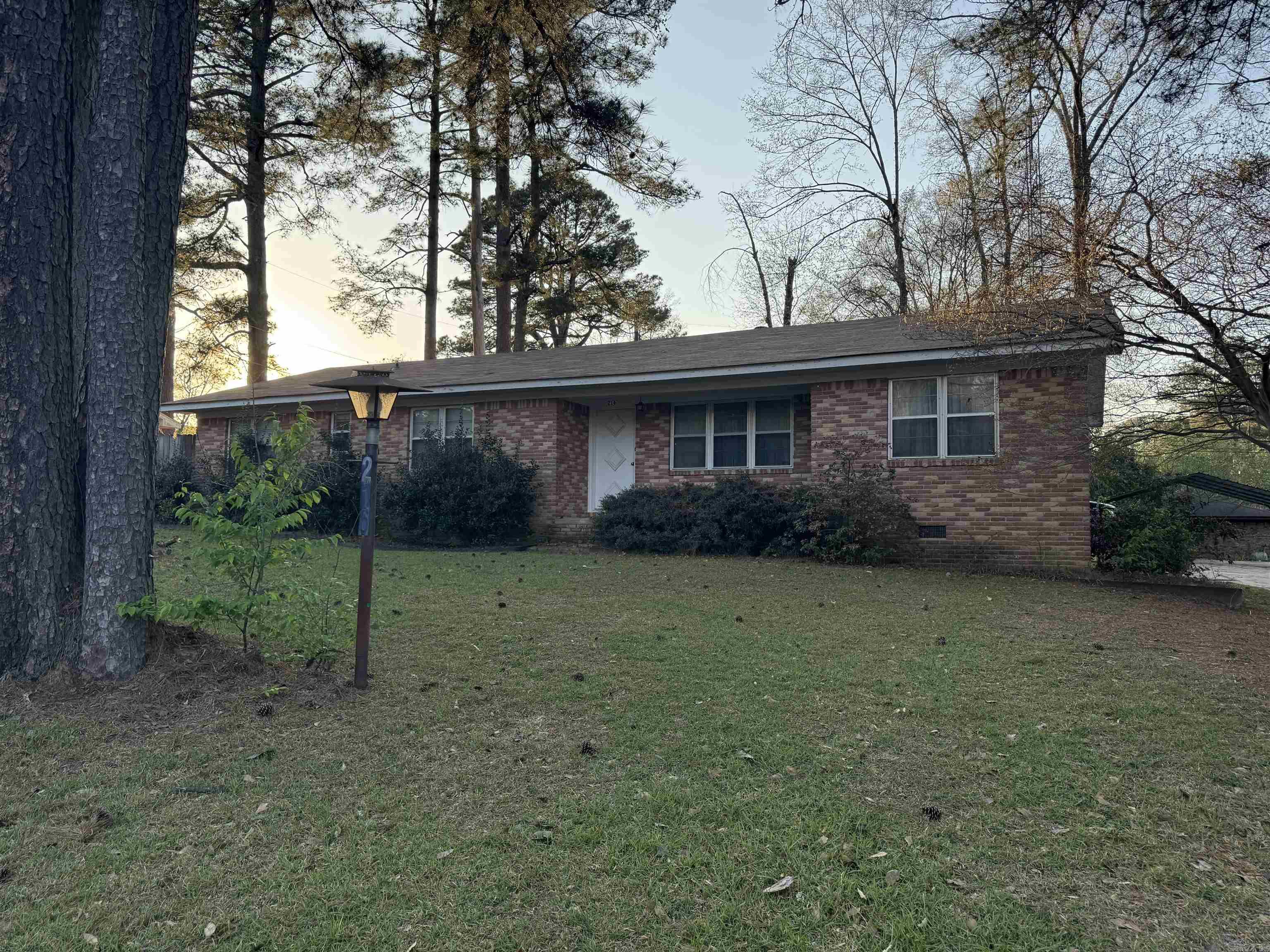 Charming and spacious 4-bedroom, 2-bath ranch-style home offering over 2,100 square feet of comfortable living space. This well-maintained property features classic brick siding and a two-car garage. Inside, you'll find multiple living areas, including a cozy family room with a fireplace, a separate den, and a dedicated home office space, providing flexibility for work, relaxation, or gatherings. The generous floor plan offers room to spread out while maintaining a warm, inviting feel throughout. Situated on a sizeable lot in an established neighborhood, it makes it ideal for growing families or those needing extra room to live and work.