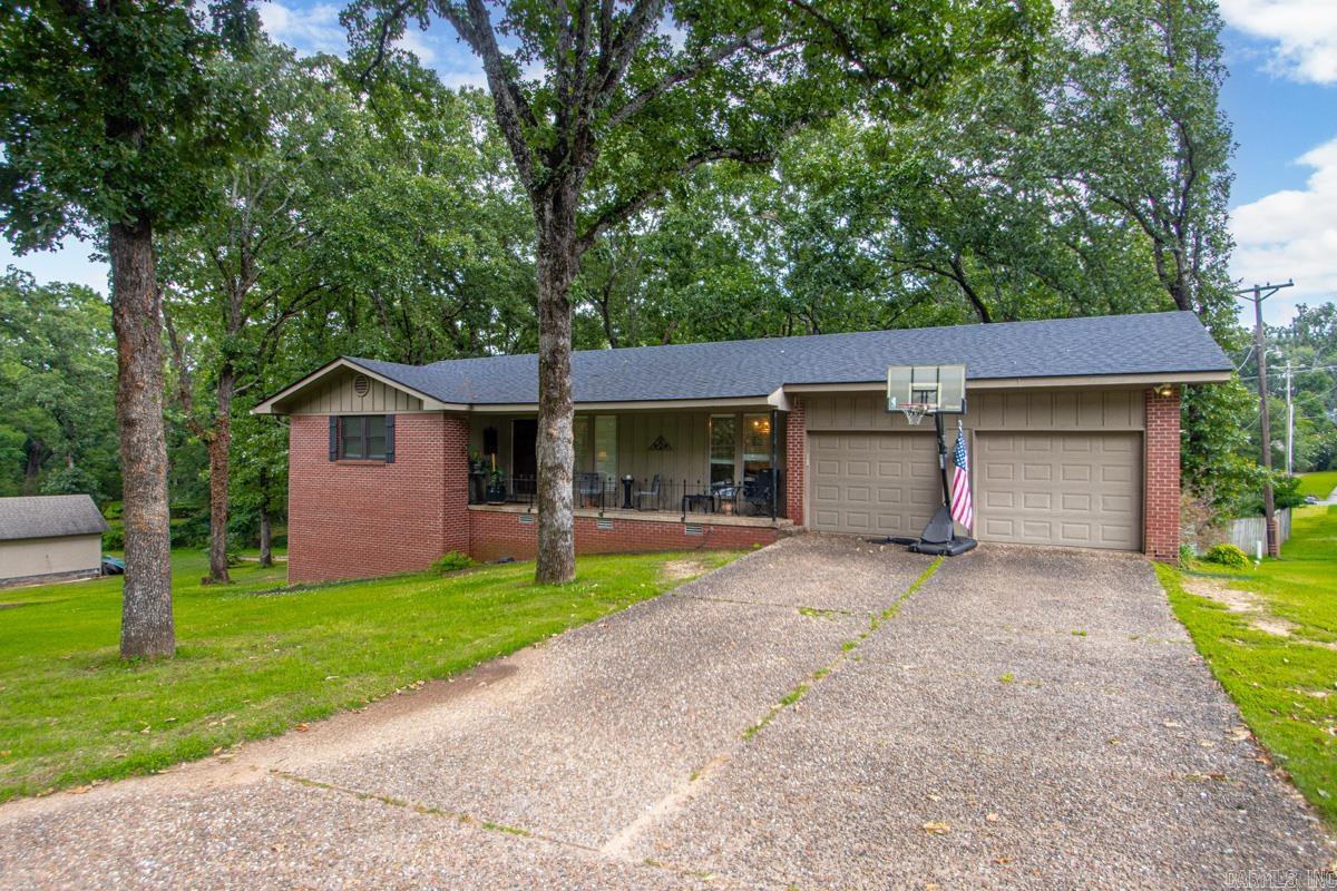 Welcome to this beautiful home in a highly sought-after neighborhood, just a short walk from Crestwood Elementary School. As you step inside, you’re greeted by an expansive, open formal living area that seamlessly flows into a dedicated dining space, perfect for both everyday living and entertaining. You will love the cozy den area with the wood burning fireplace. It is a perfect spot for watching movies with the family or reading your favorite book! The generous master suite offers a peaceful retreat, complete with a large walk-in closet and a walk-in shower. Additional highlights include a brand-new roof (just one year old) and a spacious downstairs bonus room featuring an open layout and a snack bar area. This versatile space is ideal for hosting gatherings, creating a game room, or accommodating overnight guests, truly a blank canvas to make your own. Don’t miss this exceptional opportunity! Schedule your private showing today and discover why this home is the perfect place to build lasting memories.