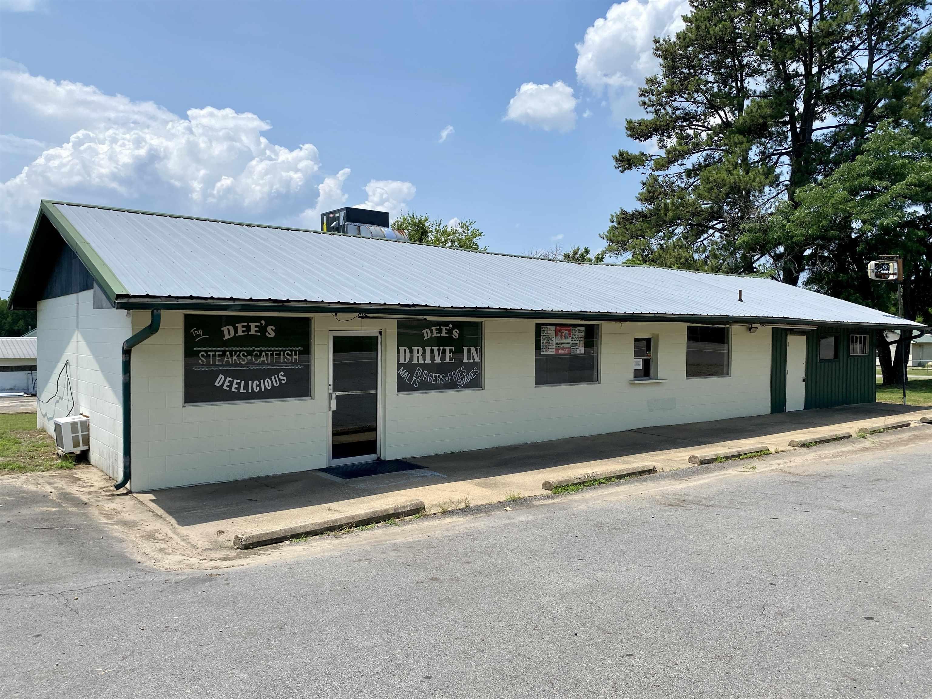 Local small town dinner offered for purchase with a proven Concept since 1968 offering nostalgia and community support.  Recently updated w/ new HVAC, fresh paint, remodeled restrooms, new floor paint, and all equipment verified to operate.  Everything conveys to begin business immediately:  Ice machine, tables, chairs,  2 refrigerated cabinets, chest freezer, griddle, fryer, vent hood, 2 refrigerator, 2 upright freezers, ice cream machine/blender, & commercial refrigerator (needs charged yearly).  Highly visible location w/ ample parking on US Hwy 64. Pole sign works but needs a new panel.  Great opportunity to start your own business for an affordable price.