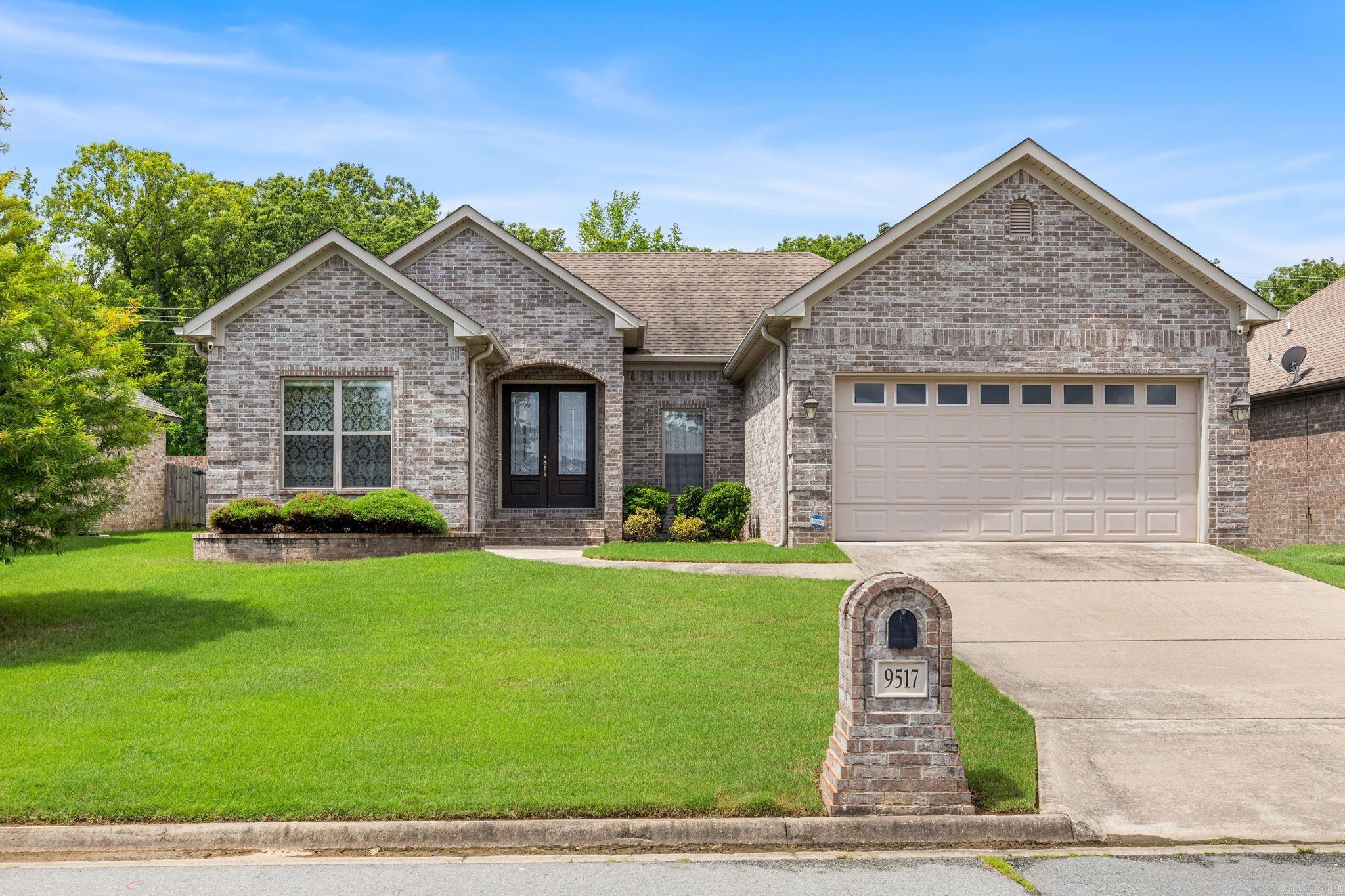 Welcome to this beautifully maintained home in the desirable Millers Glen Addition, with inviting curb appeal, and a warm, welcoming entrance, you will want to see this one! Step through the front door into an open-concept layout featuring soaring 9–10 ft. ceilings, rich hardwood flooring, and a spacious living area centered around a cozy gas log fireplace. The living room flows seamlessly into the kitchen, where granite countertops, beautiful fixtures, a gas range, and abundant workspace make everyday living and entertaining effortless. The split floor plan offers privacy, with secondary bedrooms tucked away from the primary suite. Retreat to the spacious primary bedroom featuring tray ceilings and a relaxing ensuite bath with a large walk-in closet that conveniently connects to the laundry room. Step outside to a partially covered patio perfect for morning coffee, grilling, or gathering with friends and family, with backyard space ready to enjoy, and additional storage room for all the extras. **ALL INTERIOR PHOTOS ARE FROM WHEN HOME WAS VACANT-HOME IS CURRENTLY OCCUPIED** Agents see remarks.
