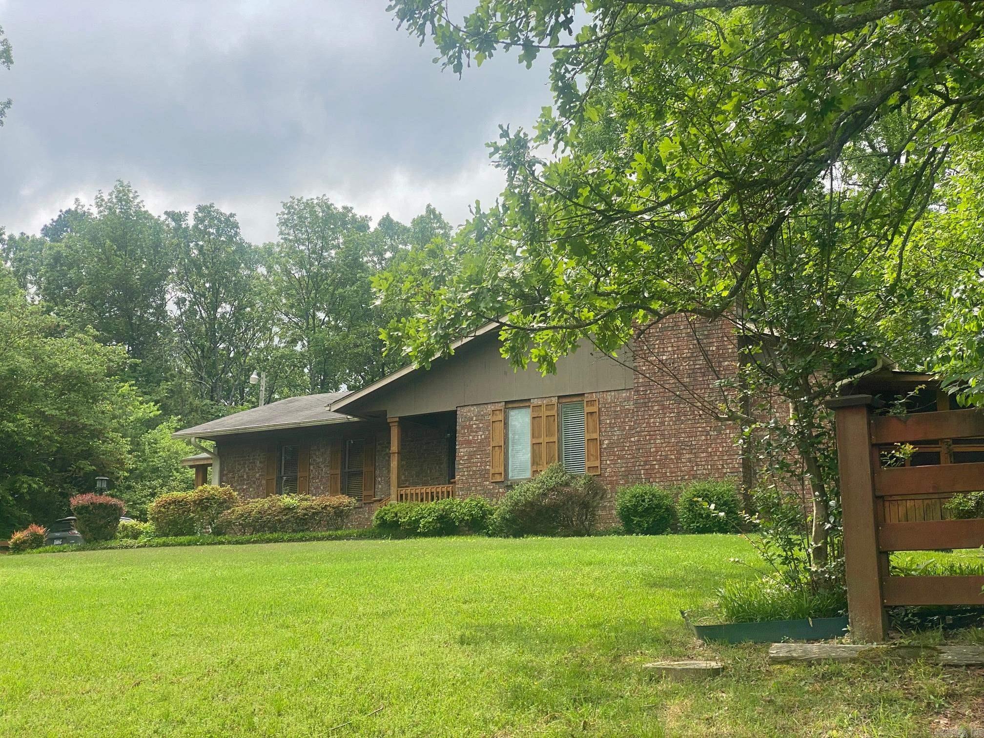 NEW ROOF AS OF FEB 17, 2025!!!!This beautiful Lakeview home is located on the outskirts of Heber Springs above the Big Dike! This home boasts a large back yard, sun porch, newly remodeled kitchen with new appliances, extra living area, basement, and has lots of curb appeal!!! This home would make a great retirement home, first time buyer or a weekend home and is located within 5 minutes of Eden Isle marina or Heber Springs Marina!!!