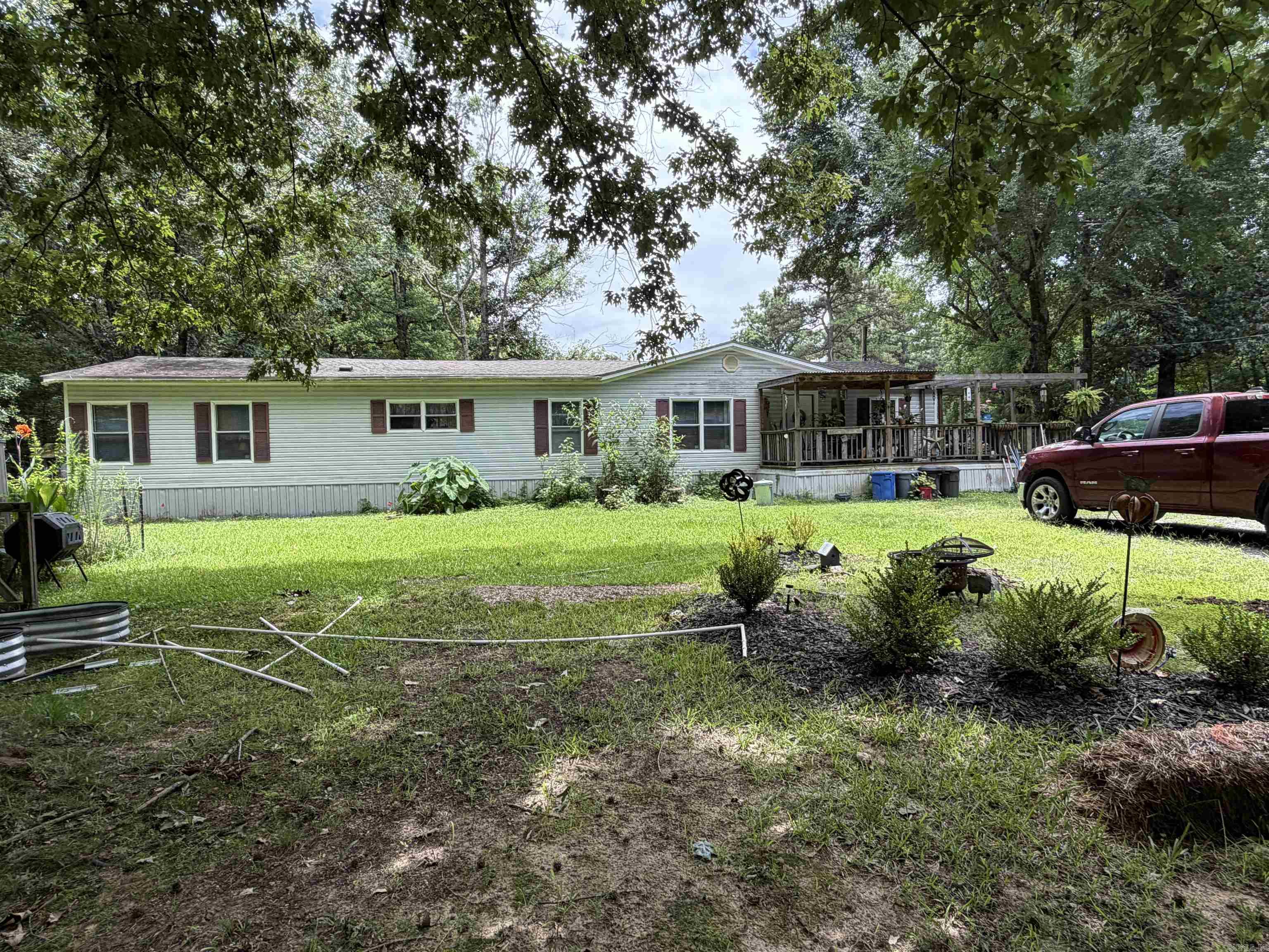 Welcome to your peaceful country retreat! Situated on a spacious 3-acre lot, this well-maintained 4-bedroom, 2-bathroom home offers the perfect blend of comfort and space. The generous layout features a functional kitchen with a convenient breakfast bar, flowing seamlessly into a separate dining area perfect for family meals. The true highlight is the expansive primary suite, featuring a private, dedicated sitting room—ideal for a home office, reading nook, or private relaxation oasis. Outside, the 3 acres provide endless possibilities for gardening, workshops, or simply enjoying your open, serene surroundings. Schedule your tour today!