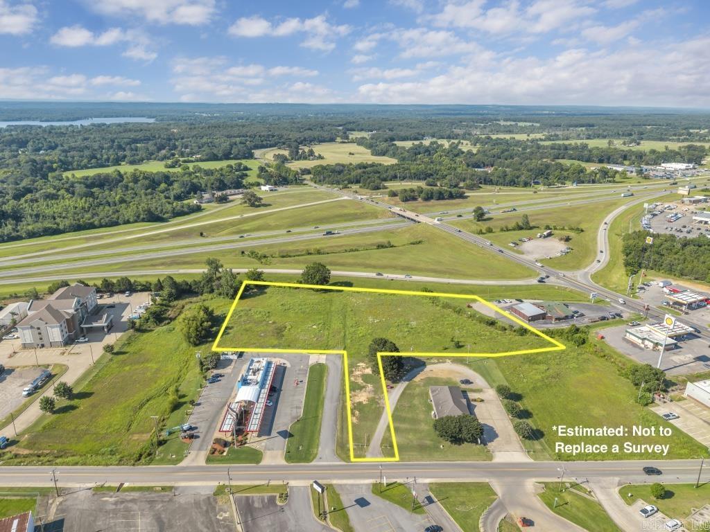 This prime property highly visible from both I-40 and Highway 9.  This is one of the few tracts left this close to I-40 Exit 108 with this amount of available acreage.  The property includes a strip of land adequate to build a driveway /street to connect to Bruce street.  The property is zoned B-3 Highway Service, which allows for outside open display.